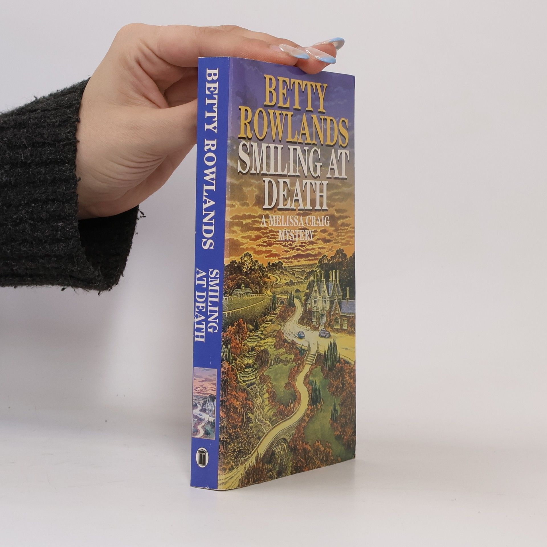 Betty Rowlands Melissa Craig Mystery: Smiling at Death