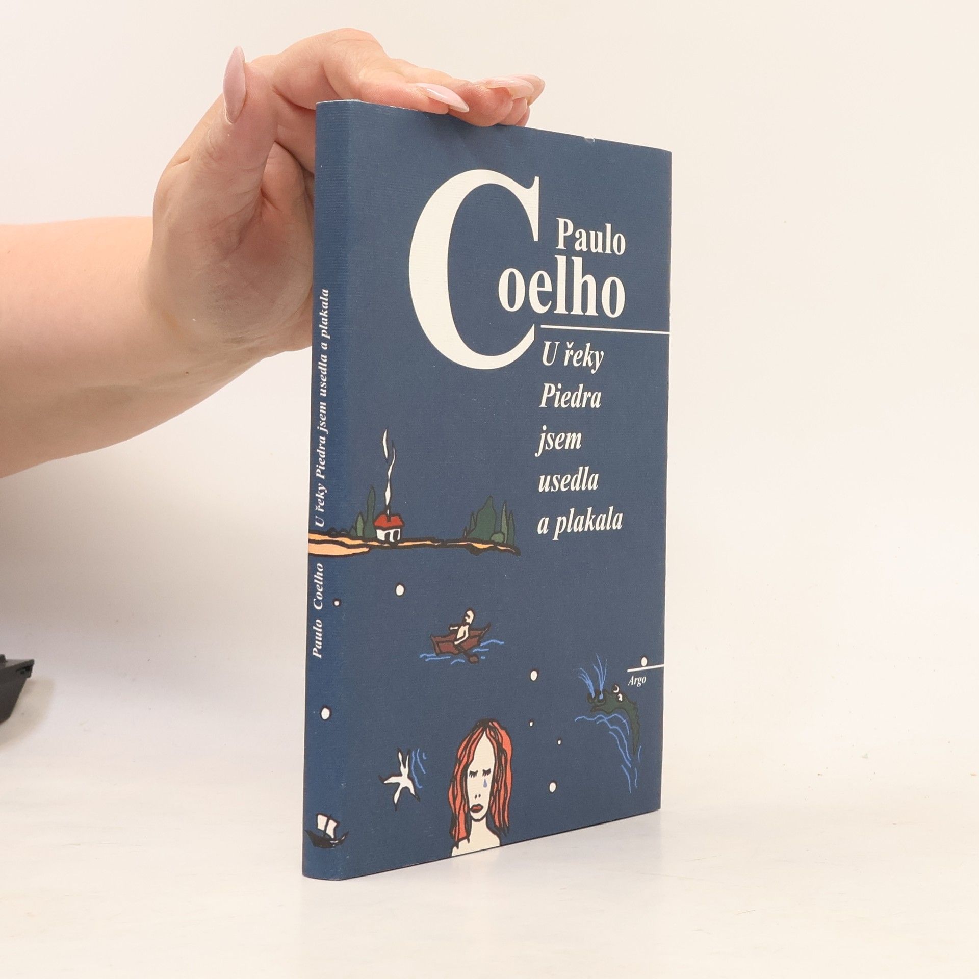 Paulo Coelho U řeky Piedra jsem usedla a plakala