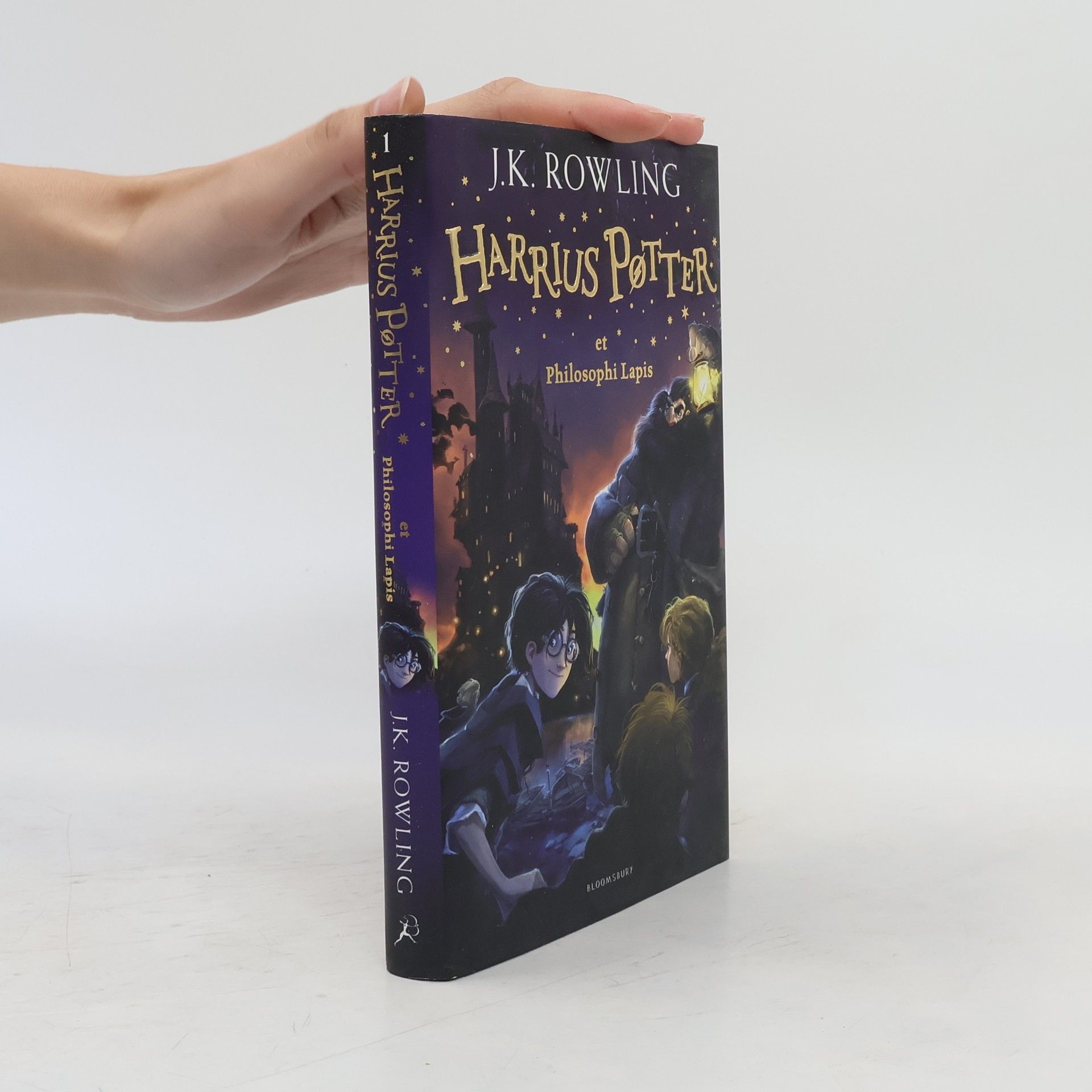 J. K. Rowling Harrius Potter et Philosophi Lapis