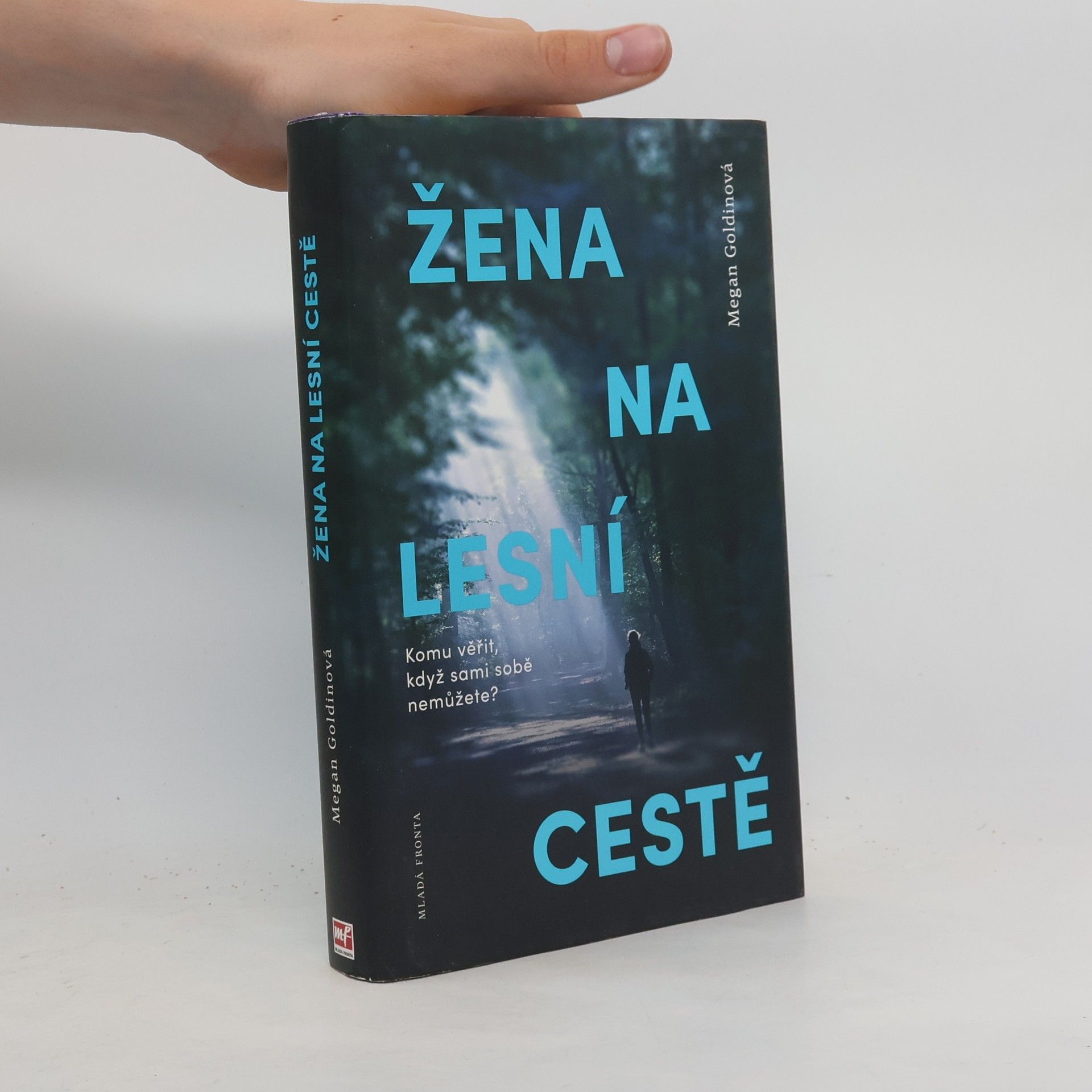 Megan Goldin Žena na lesní cestě