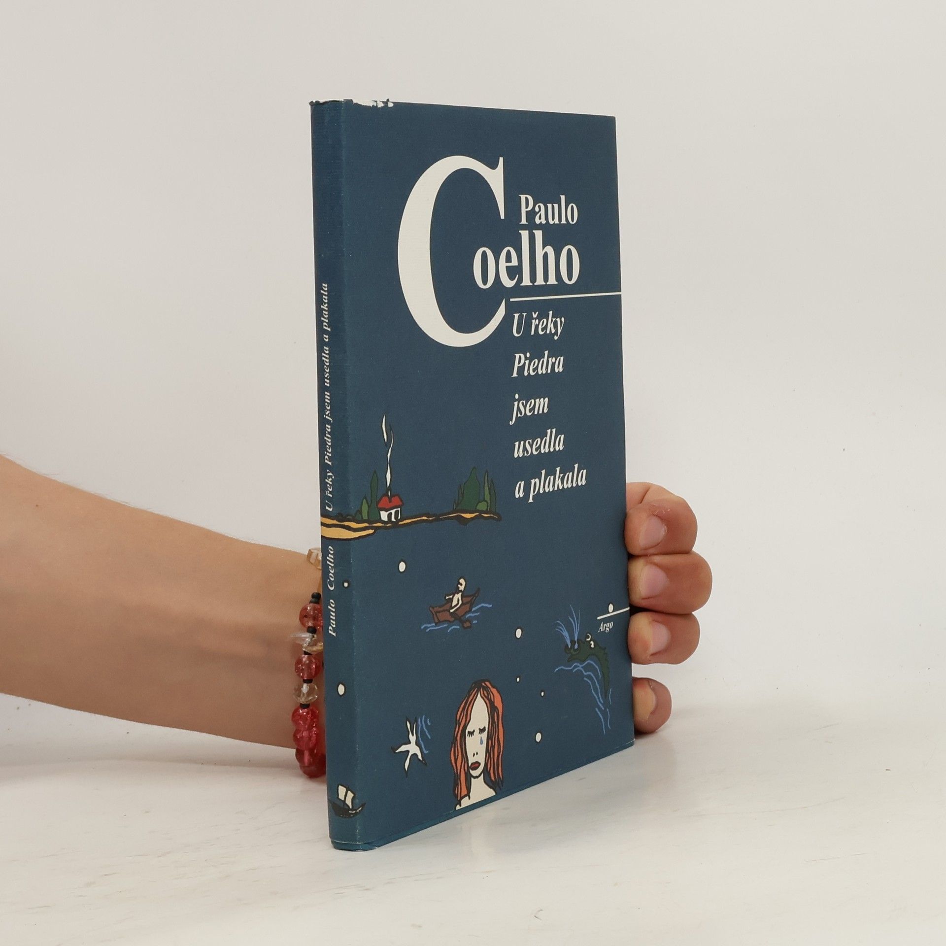 Paulo Coelho U řeky Piedra jsem usedla a plakala