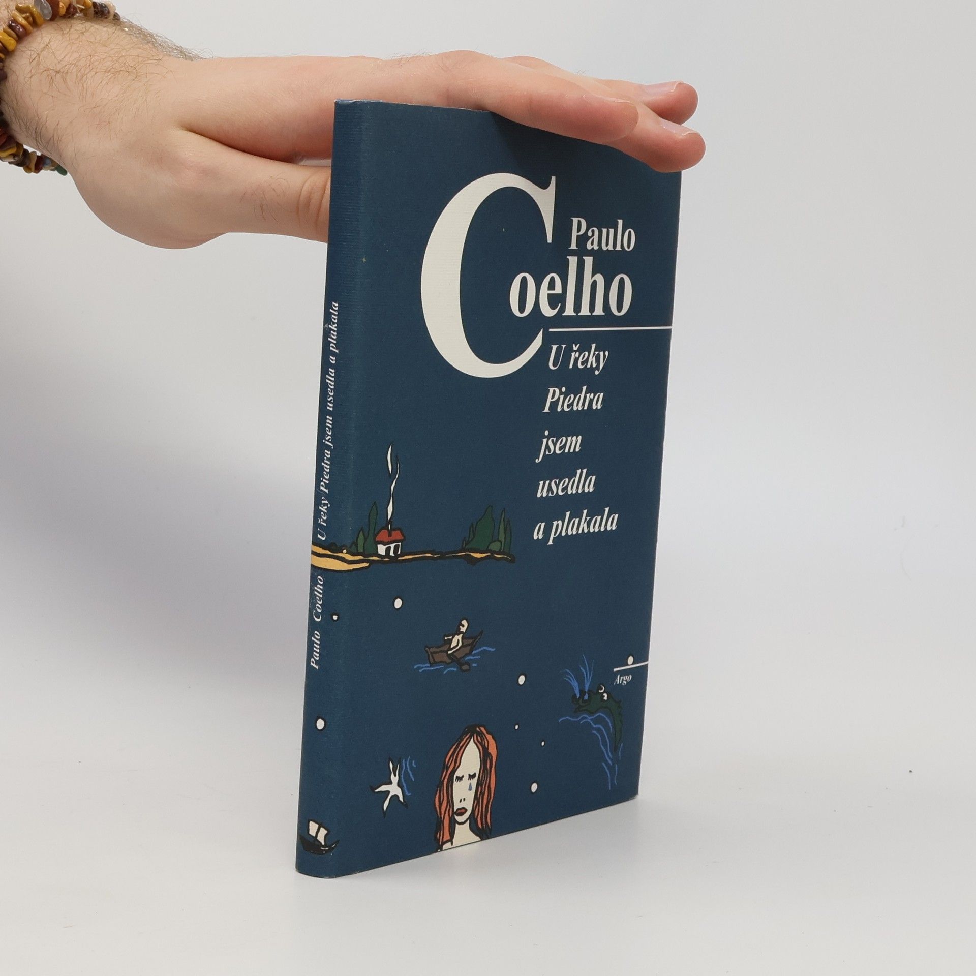 Paulo Coelho U řeky Piedra jsem usedla a plakala