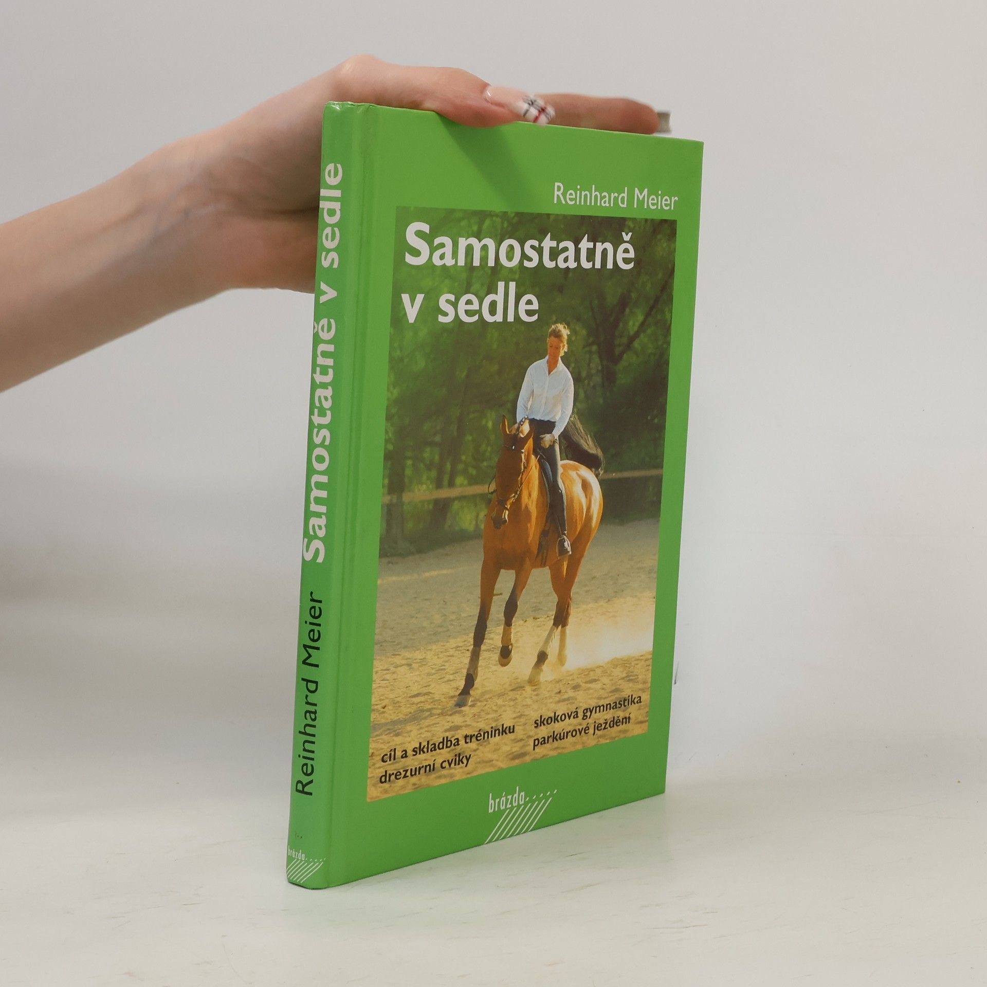 Reinhard Meier Samostatně v sedle : cíl a skladba tréninku, drezurní cviky, skoková gymnastika, parkúrové ježdění