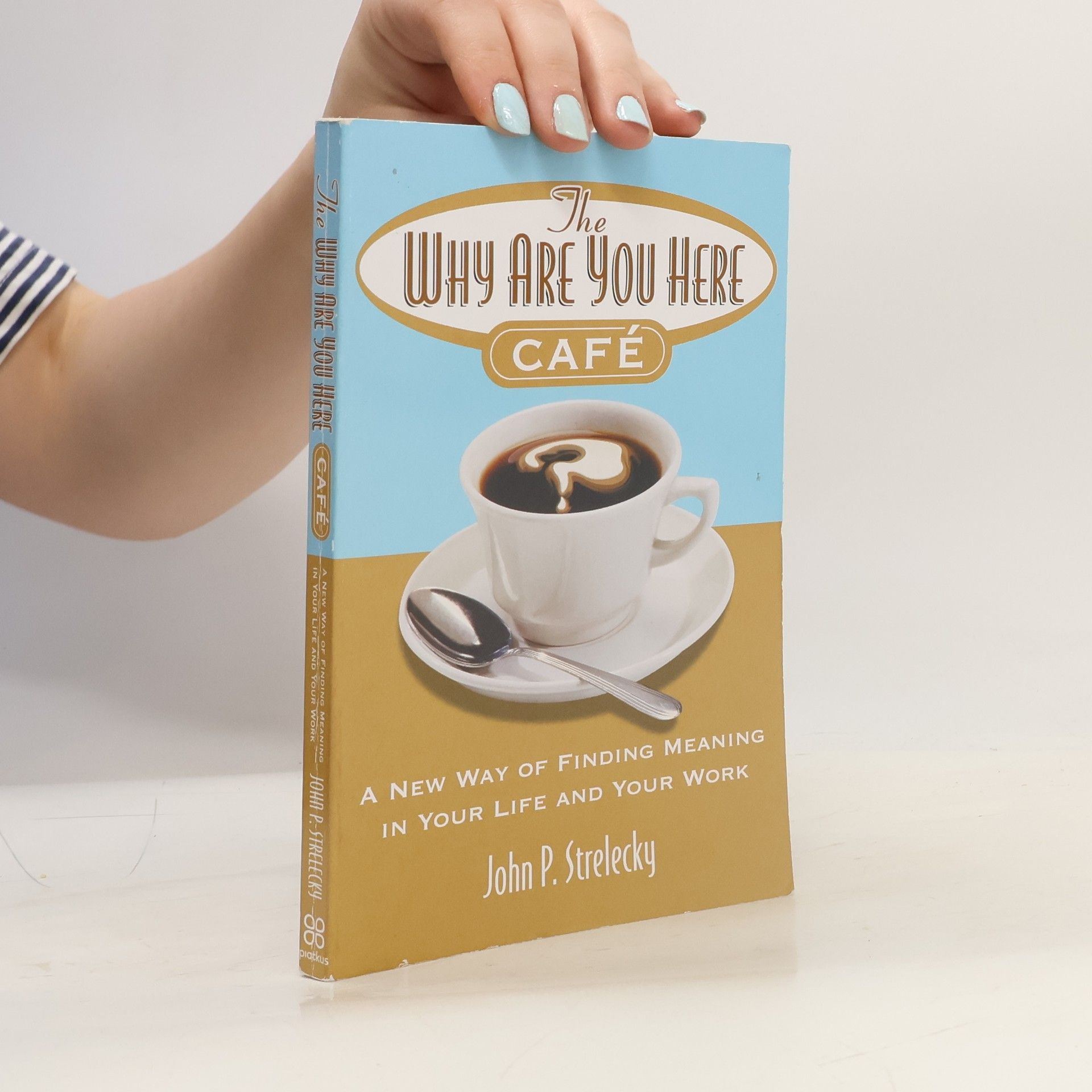 John P. Strelecky The why are you here cafe : a new way of finding meaning in your life and your work