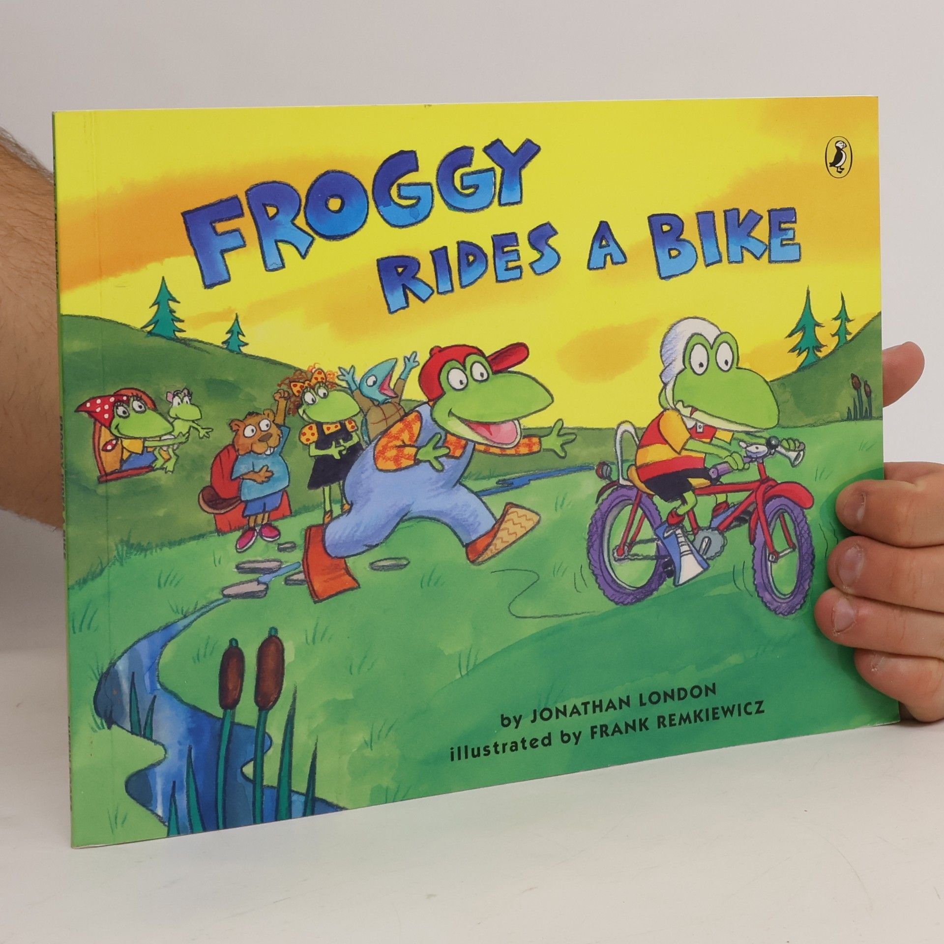 Froggy Rides a Bike
