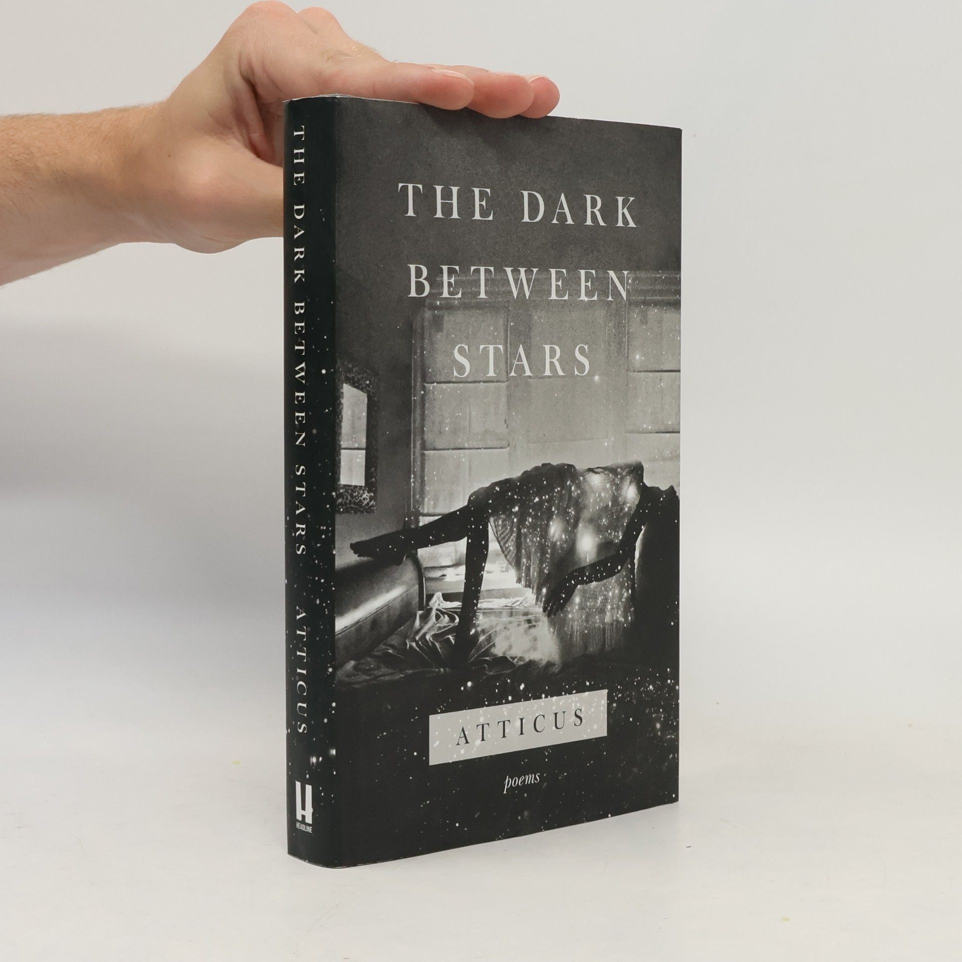 Atticus The dark between stars: Poems