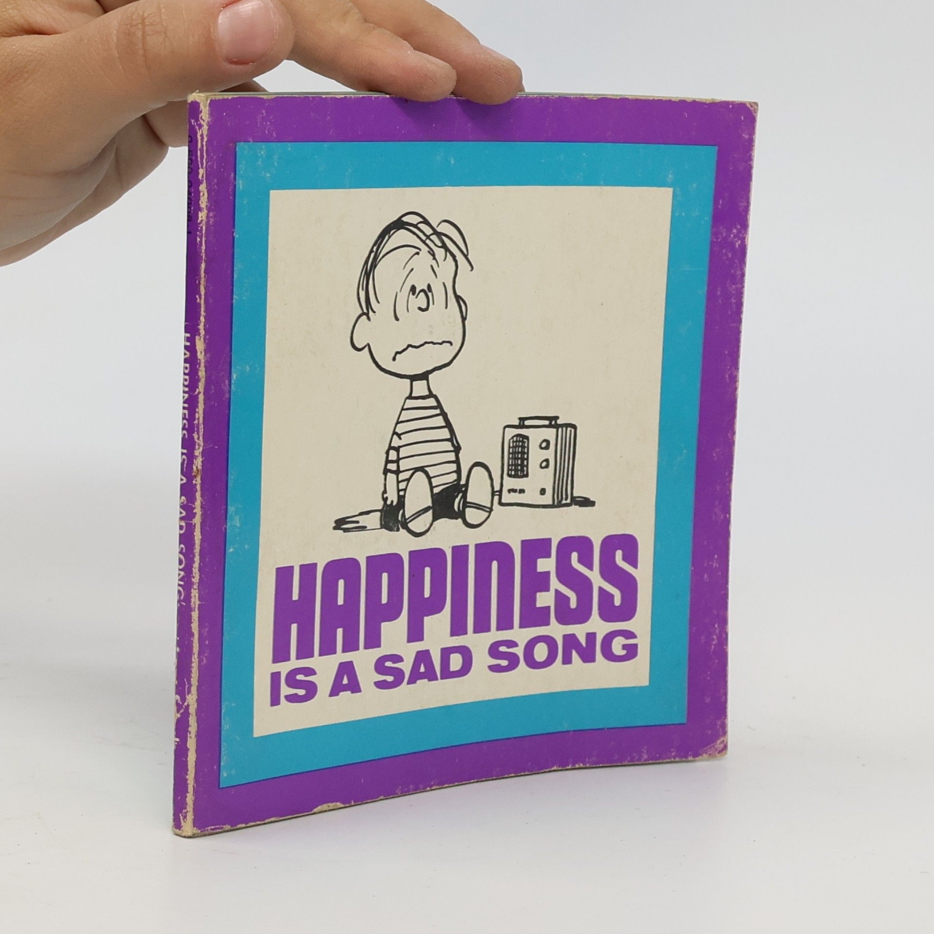 Charlese M. Schulz Happiness is a Sad Song
