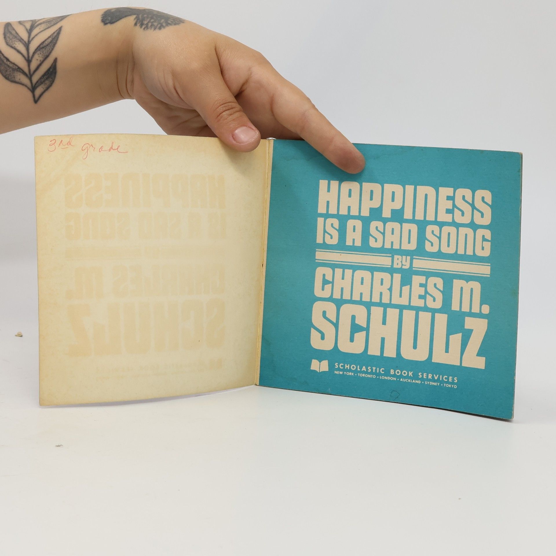 Charlese M. Schulz Happiness is a Sad Song