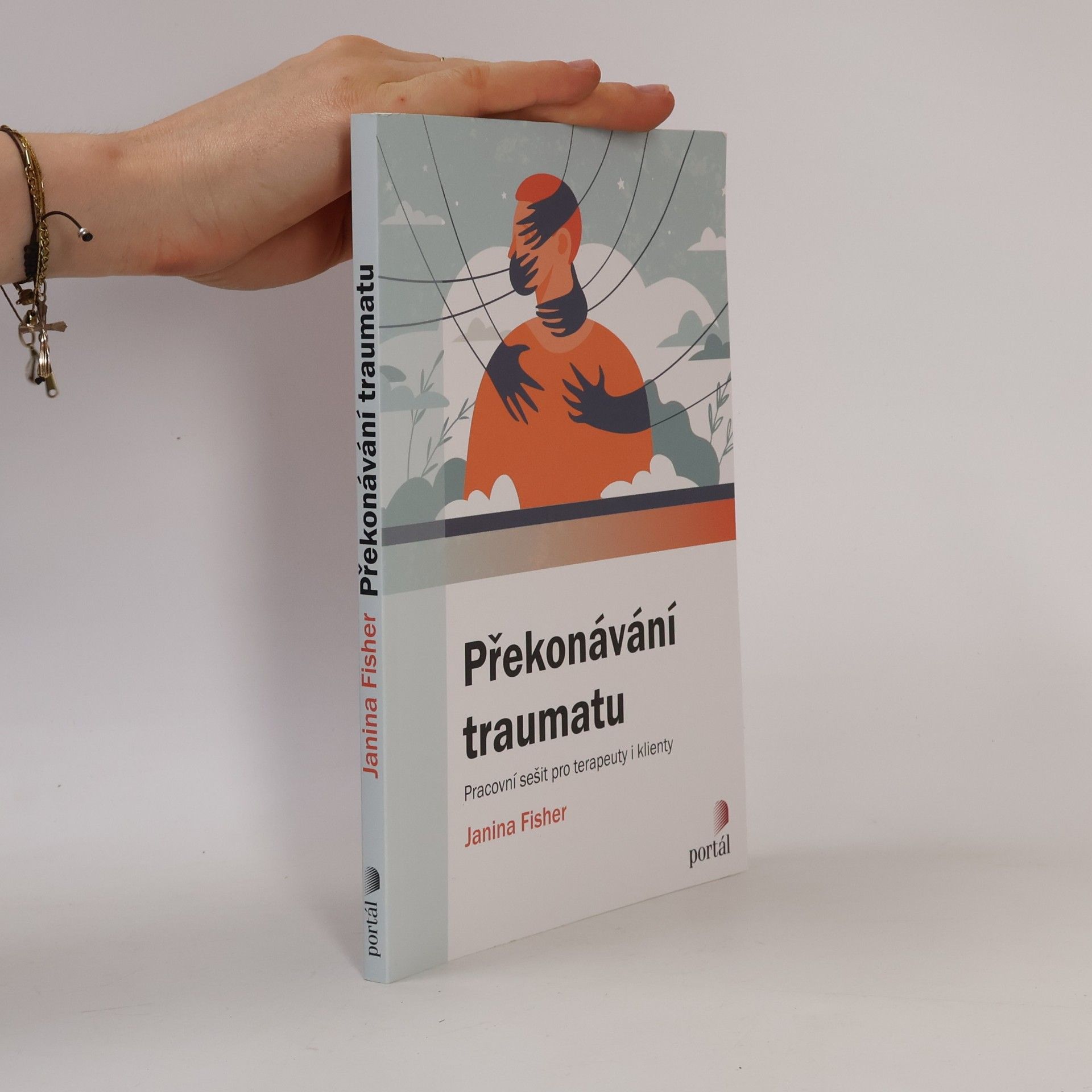 Janina Fisher Překonávání traumatu: pracovní sešit pro terapeuty i klienty