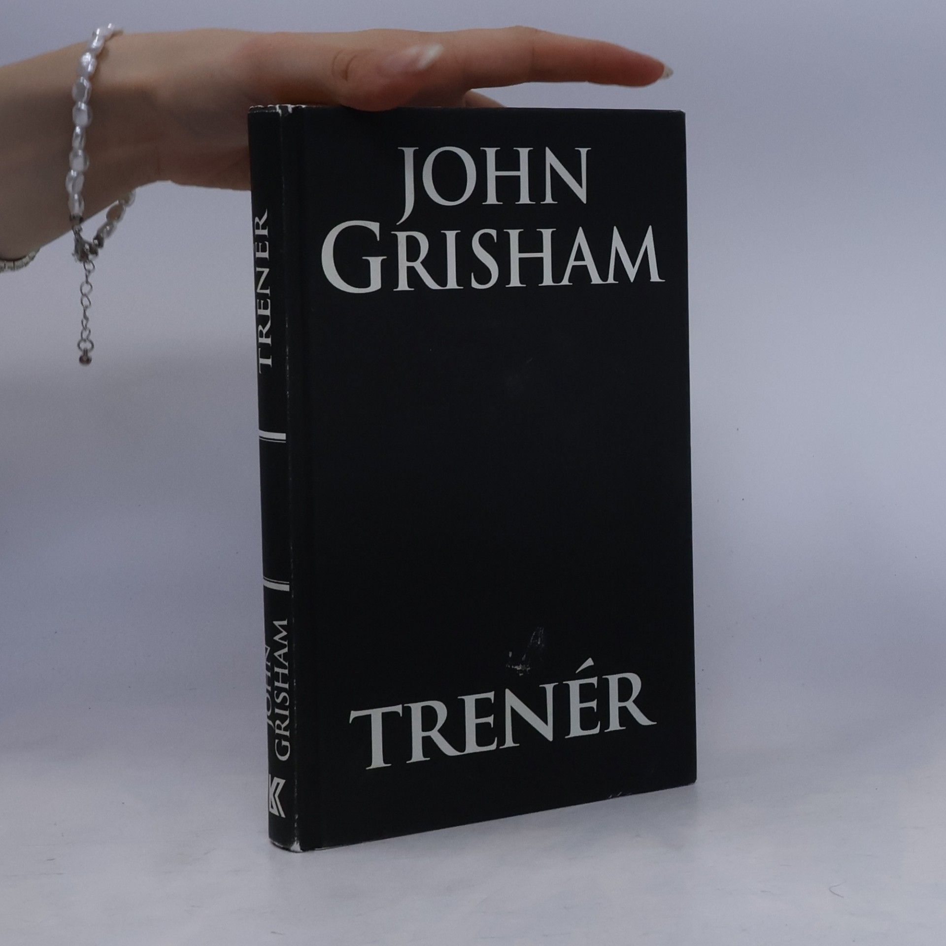 John Grisham Trenér