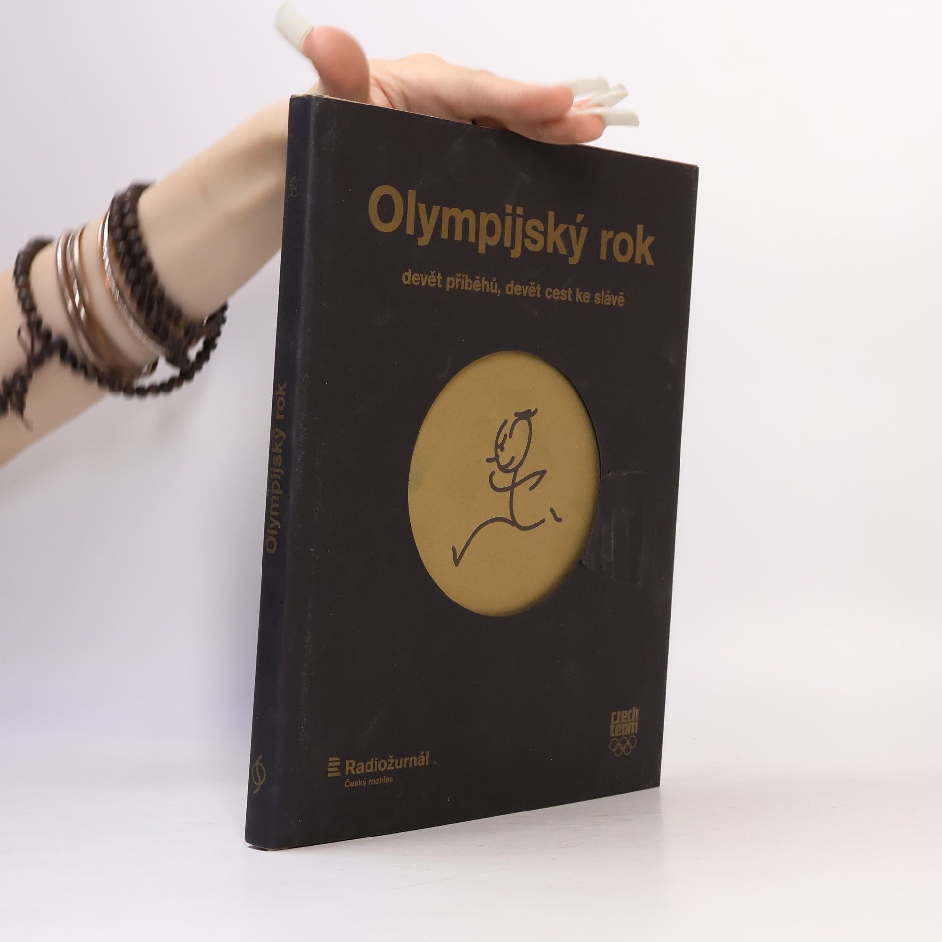 Herbert Slavík Olympijský rok. Devět příběhů, devět cest ke slávě.