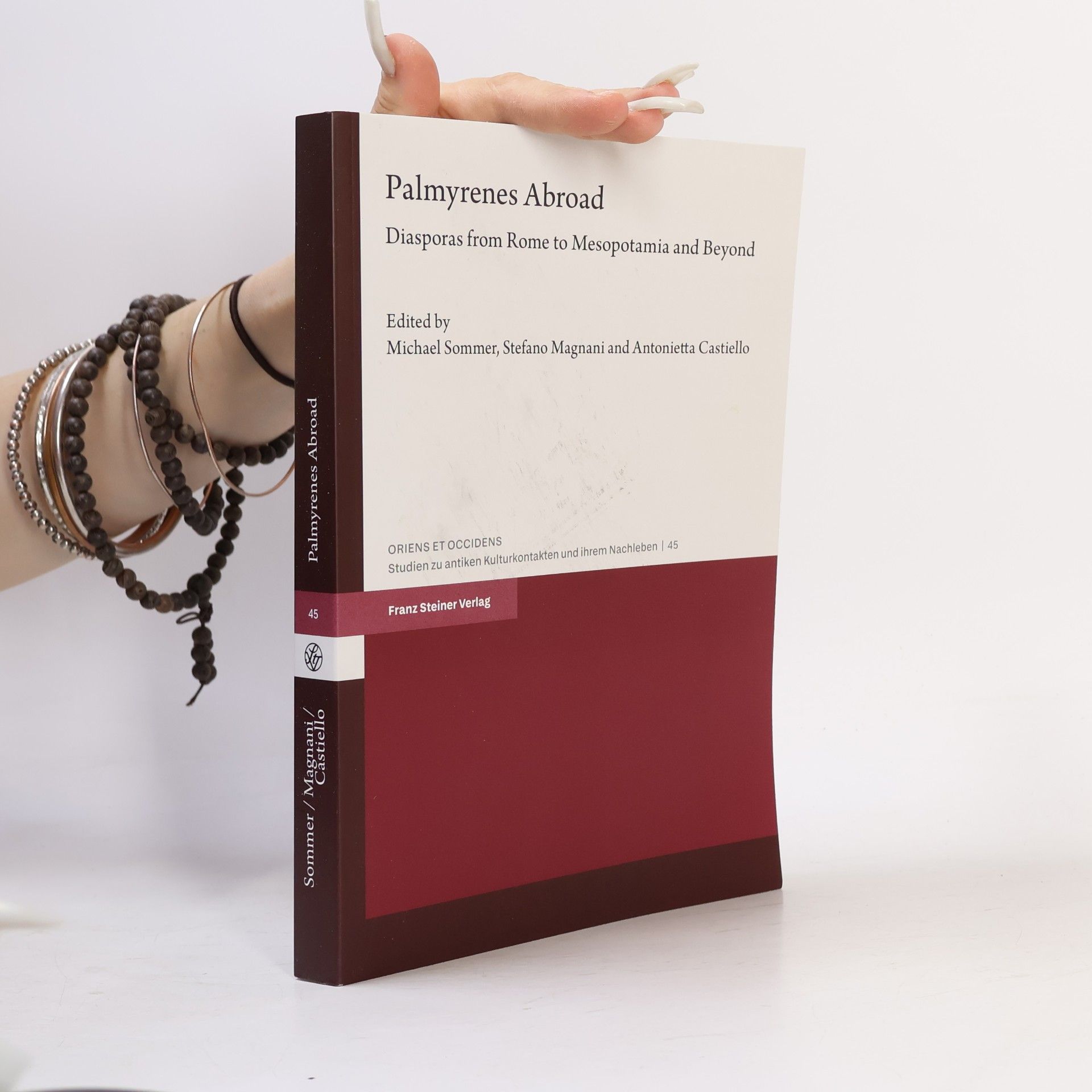 Antonietta Castiello Oriens et Occidens: Studien zu antiken Kulturkontakten und ihrem Nachleben - 45: Palmyrenes Abroad: Diasporas from Rome to Mesopotamia and Beyond