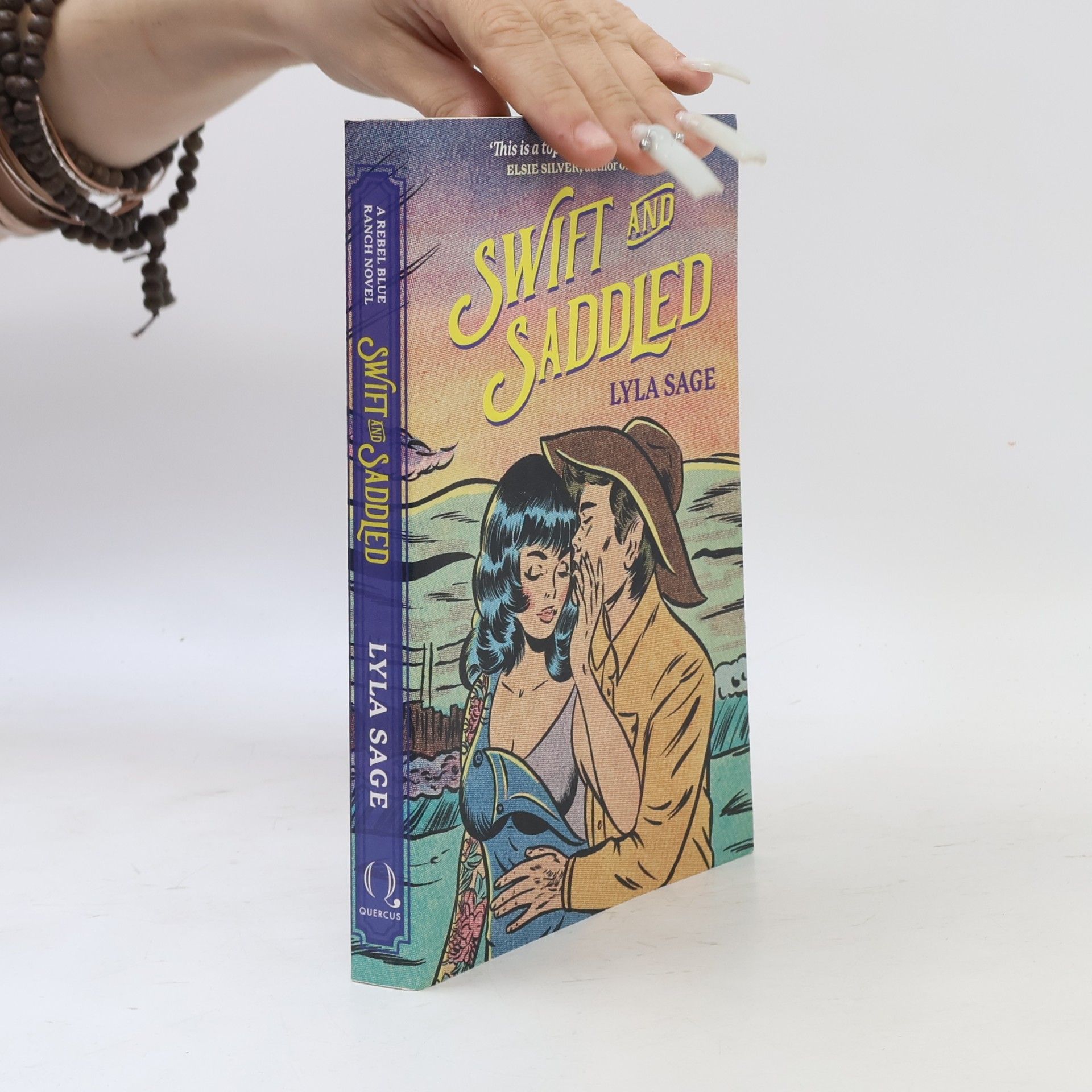 Lyla Sage Swift and Saddled: A sweet and steamy forced proximity romance from the author of TikTok sensation DONE AND DUSTED!