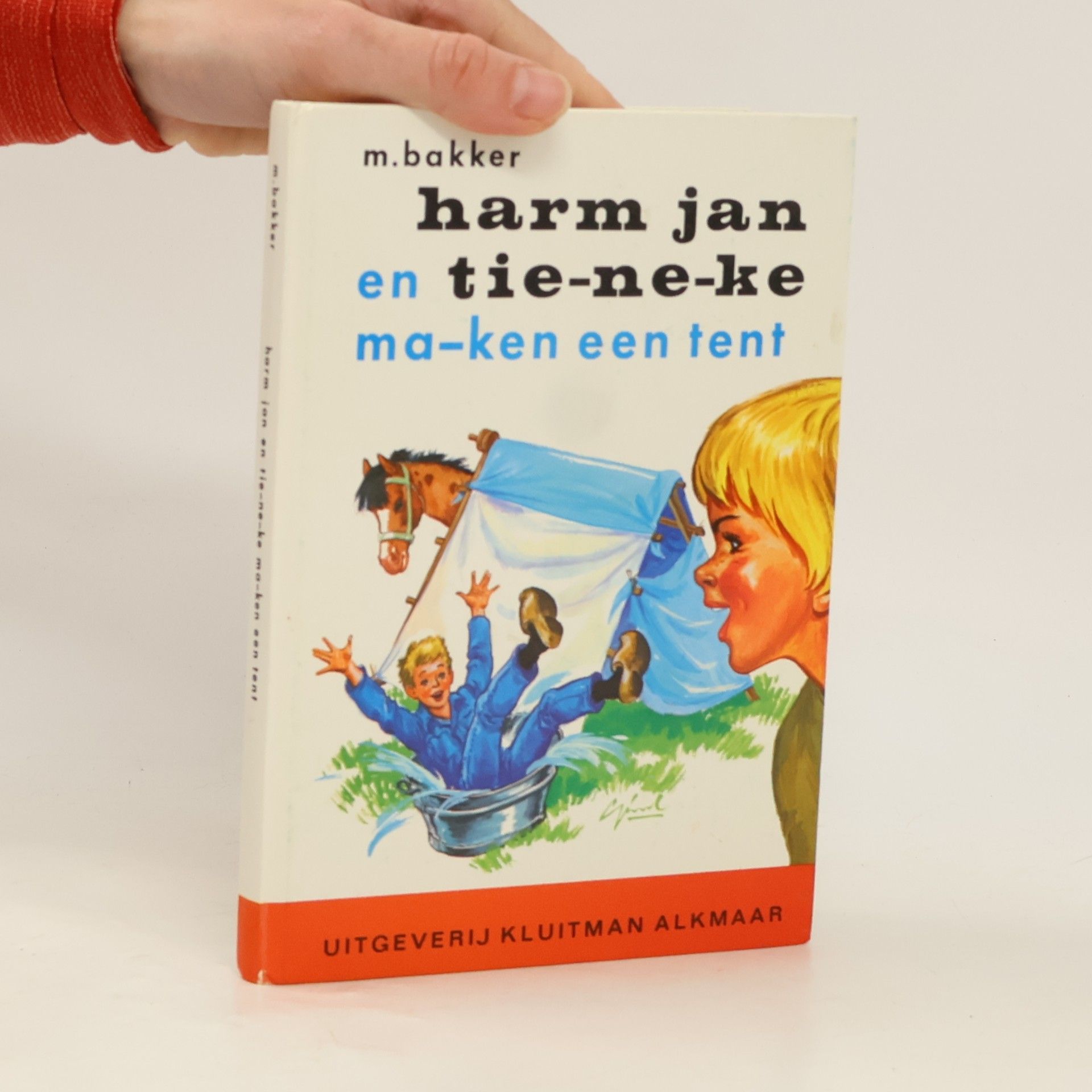 M. Bakker Harm jan en Tie-ne-ke ma-ken een tent