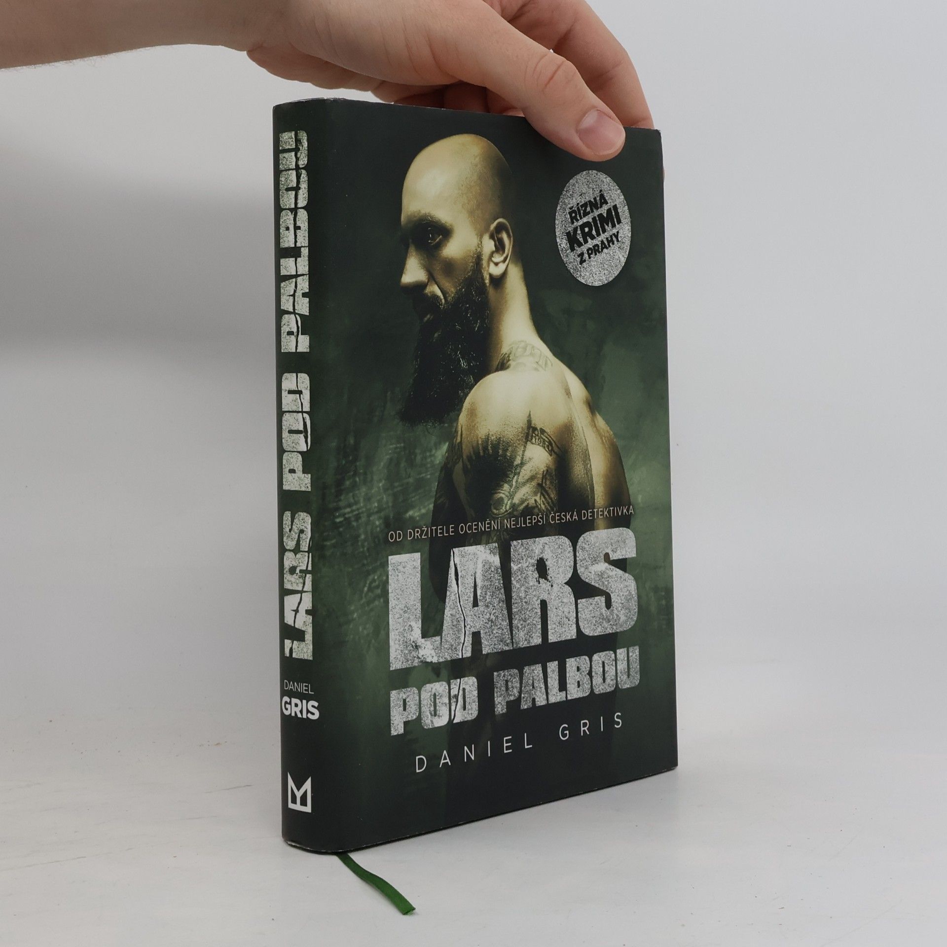 Daniel Gris Lars pod palbou