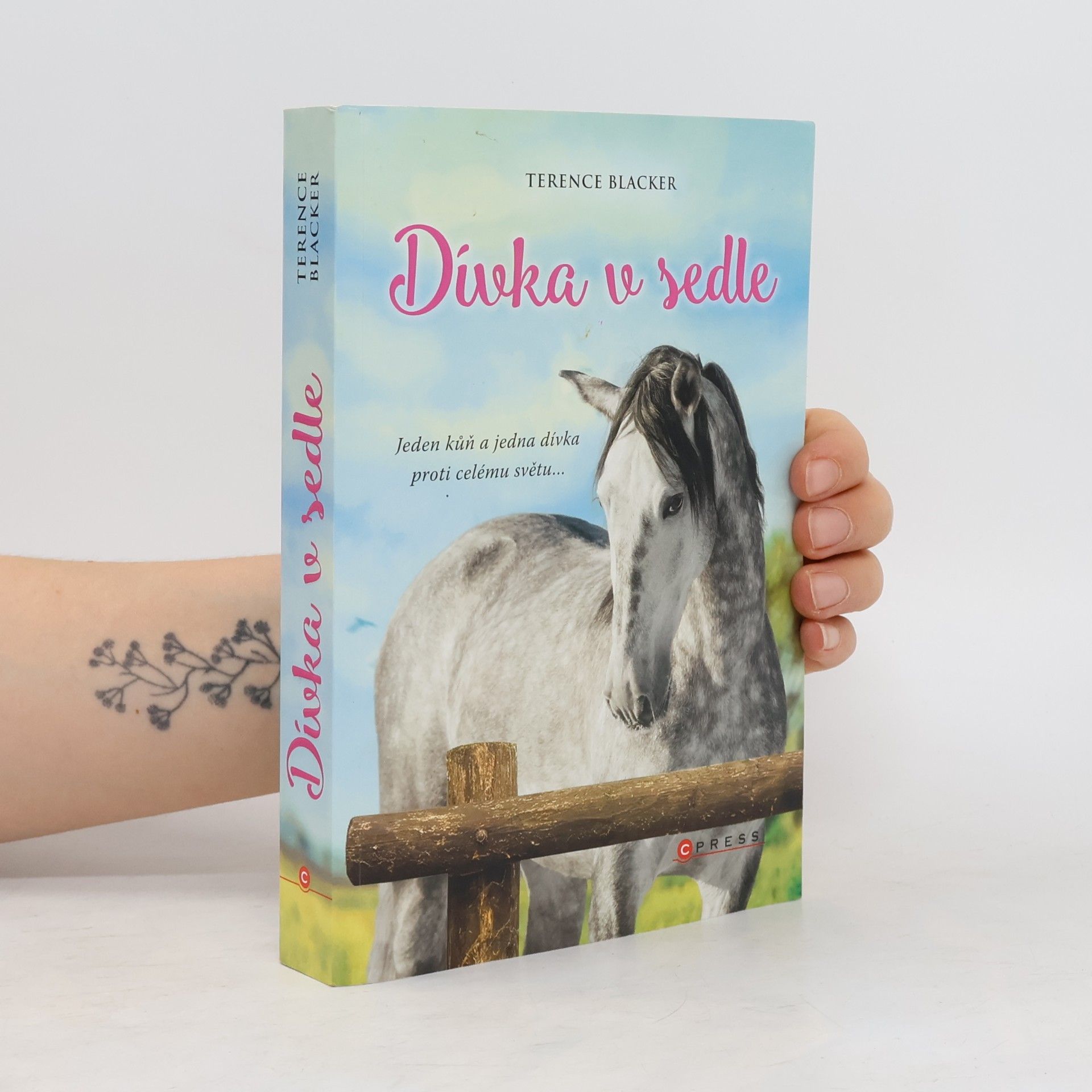 Dívka v sedle