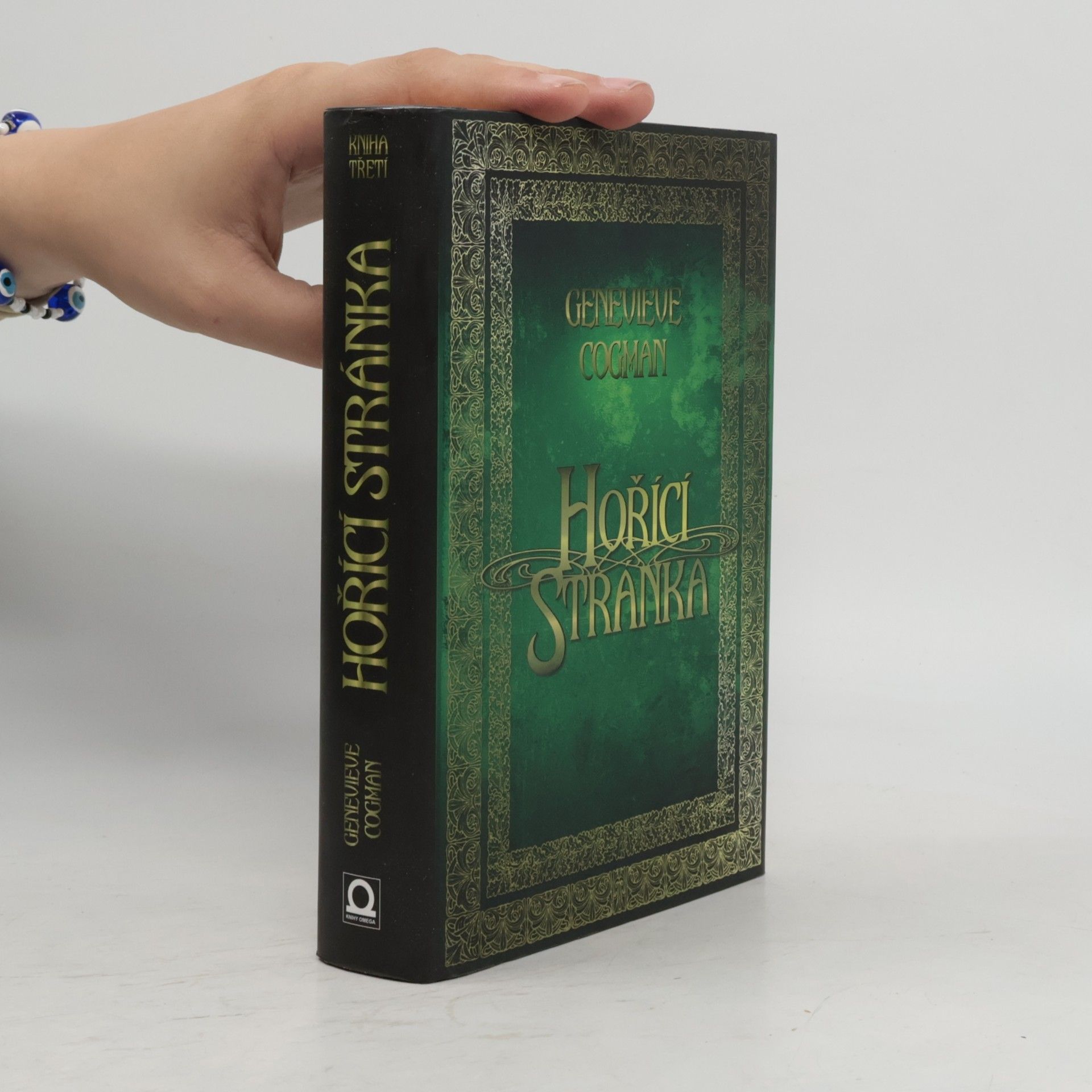 Genevieve Cogman Neviditelná knihovna. Kniha třetí. Hořící stránka