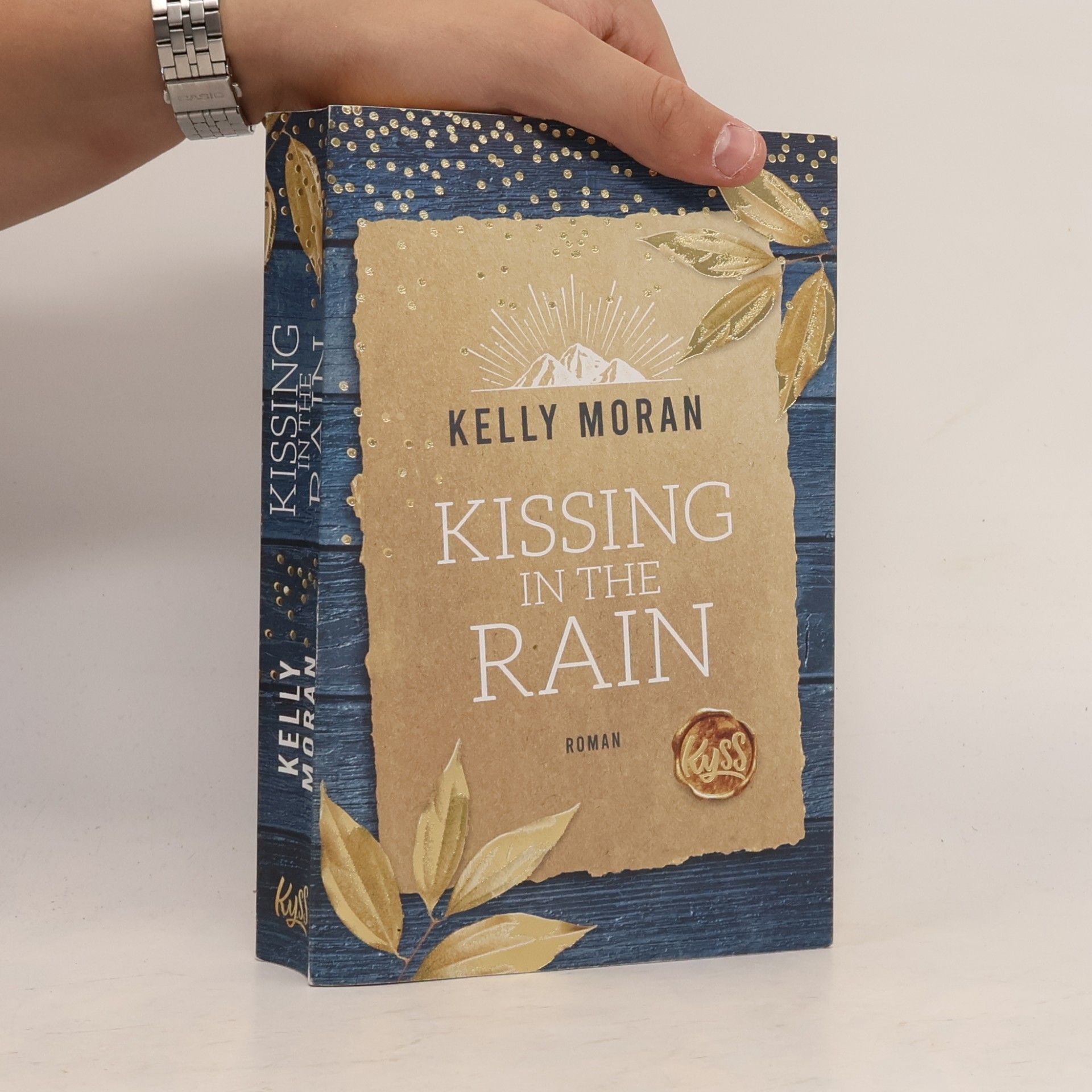 Kelly Moran Kissing in the Rain