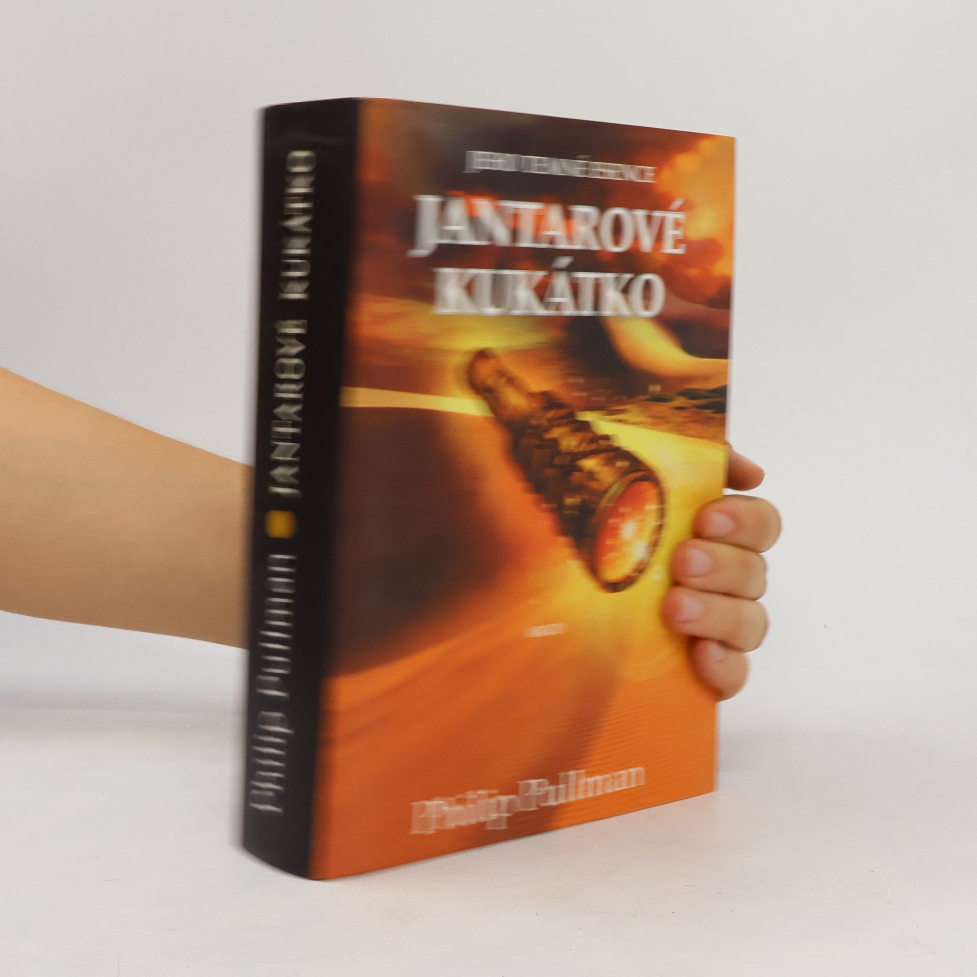 Philip Pullman Jeho temné esence. Jantarové kukátko