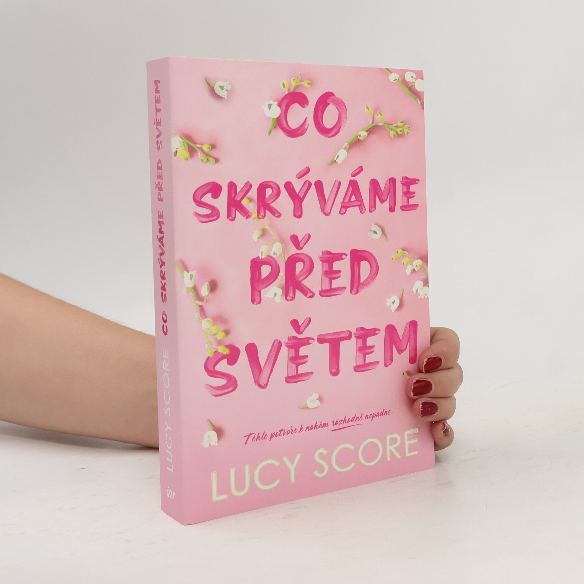 Lucy Score Co skrýváme před světem