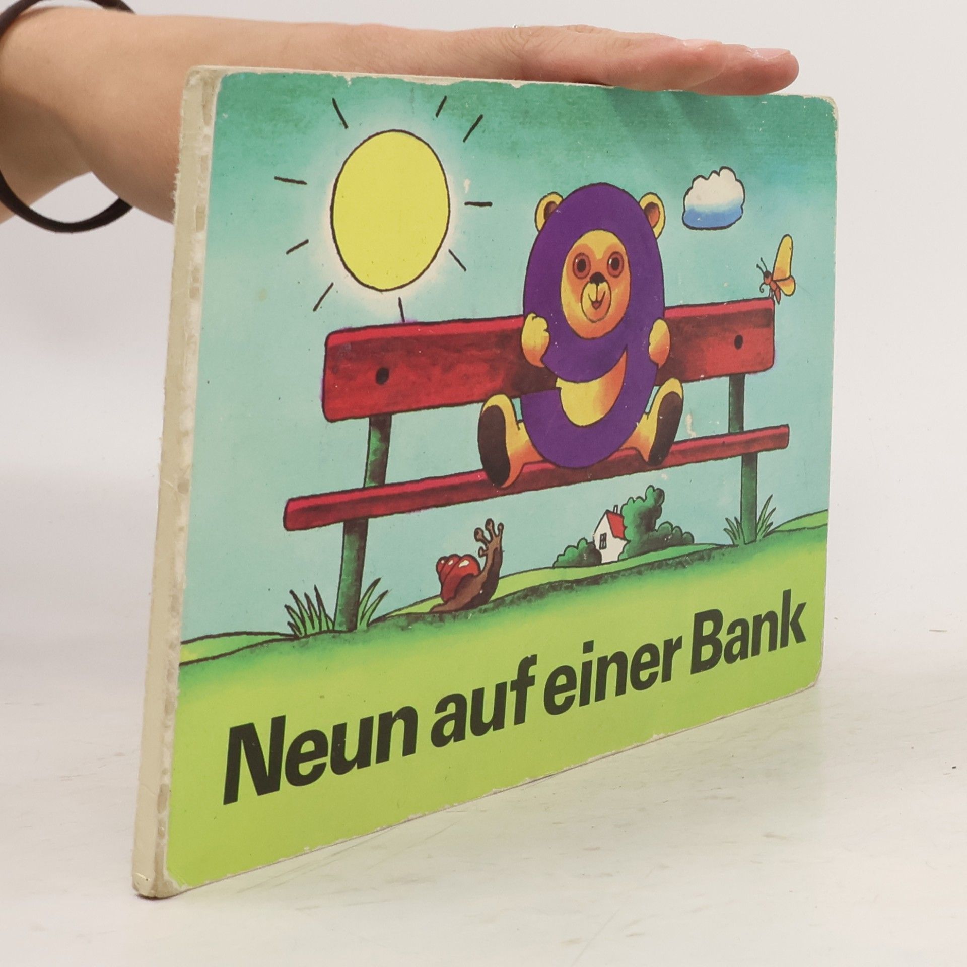 Auteurscollectief Neun auf einer Bank