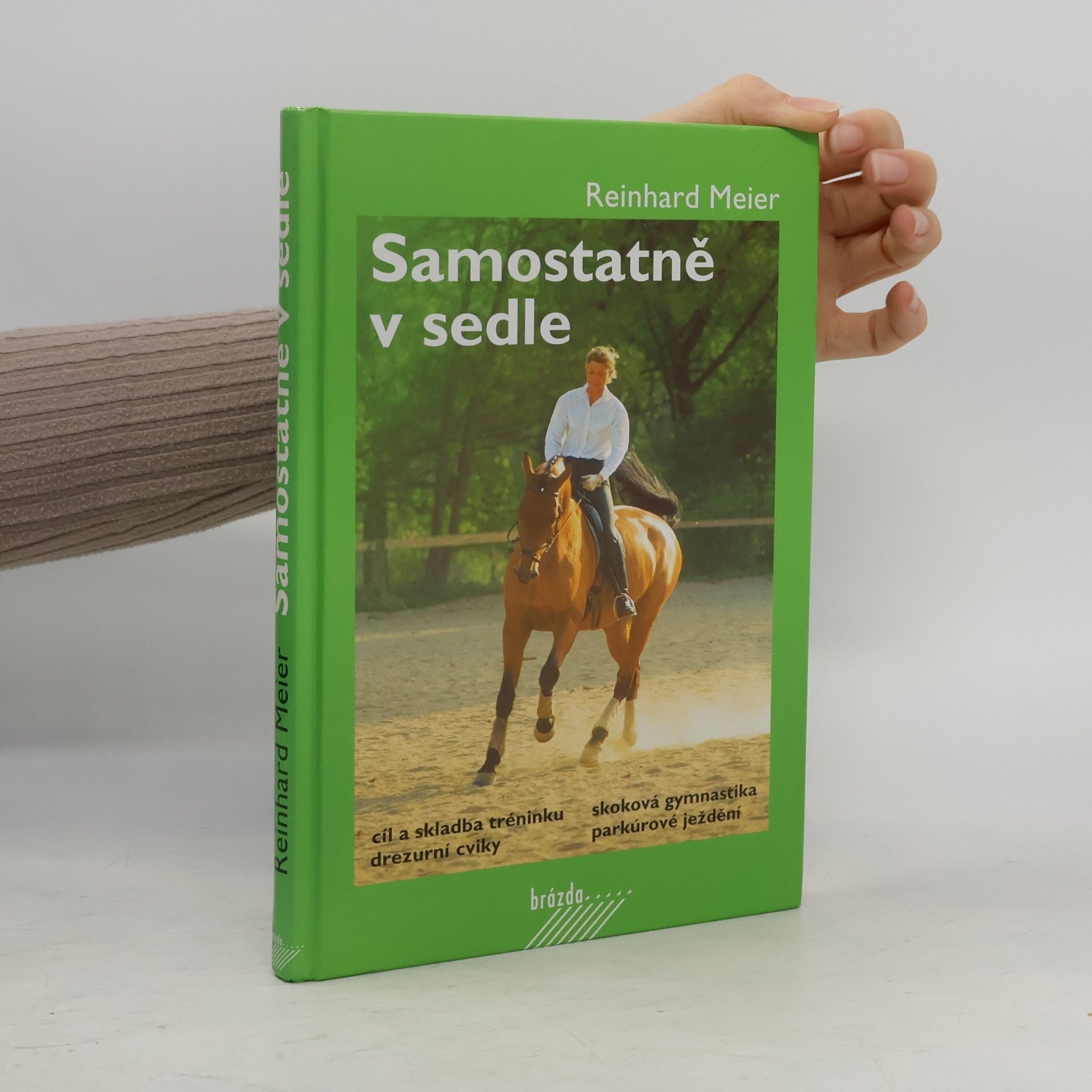 Reinhard Meier Samostatně v sedle : cíl a skladba tréninku, drezurní cviky, skoková gymnastika, parkúrové ježdění