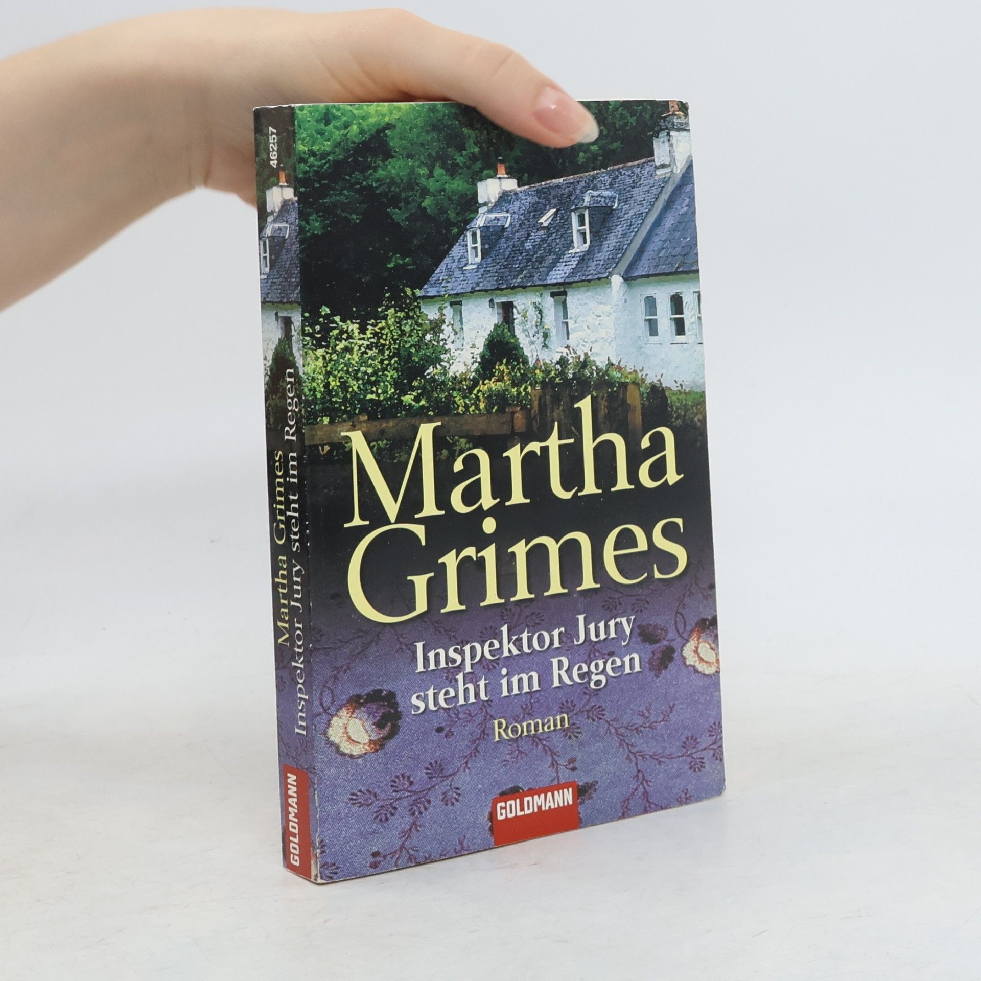 Martha Grimes Inspektor Jury steht im Regen