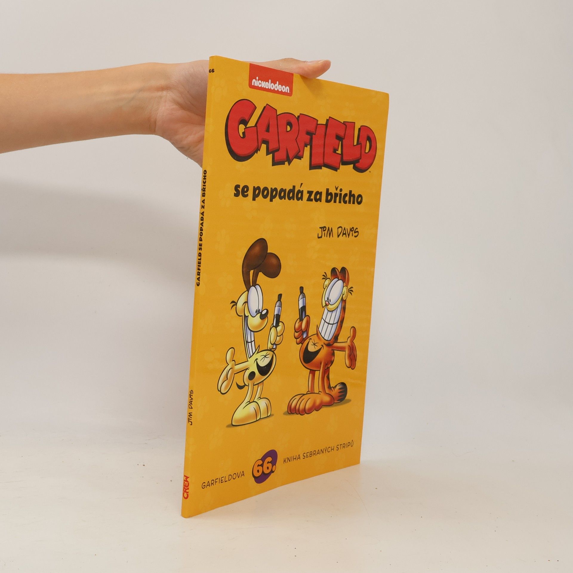 Jim Davis Garfield se popadá za břicho