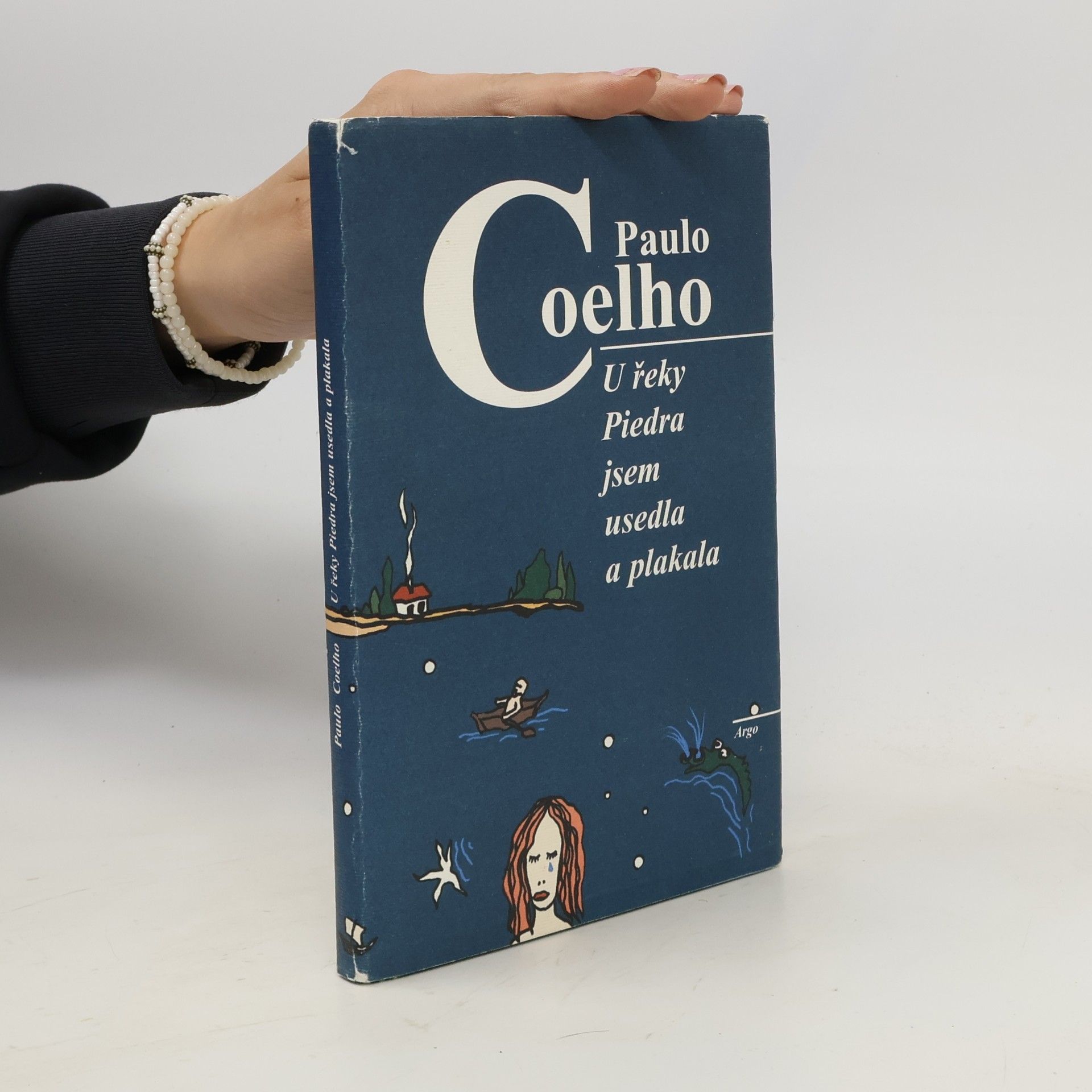 Paulo Coelho U řeky Piedra jsem usedla a plakala