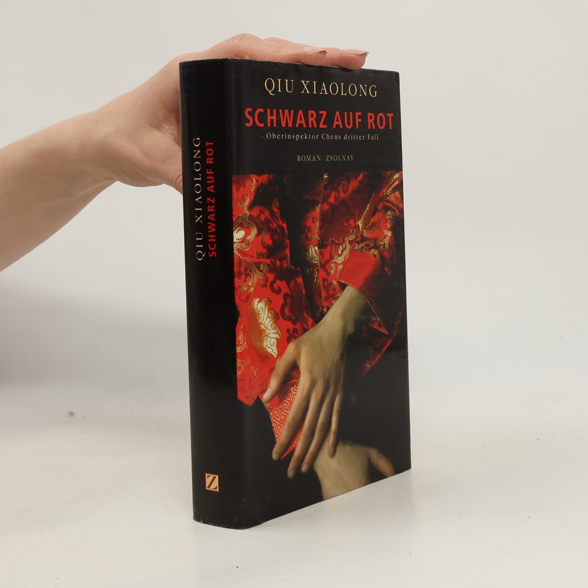 Qiu Xiaolong Schwarz auf Rot