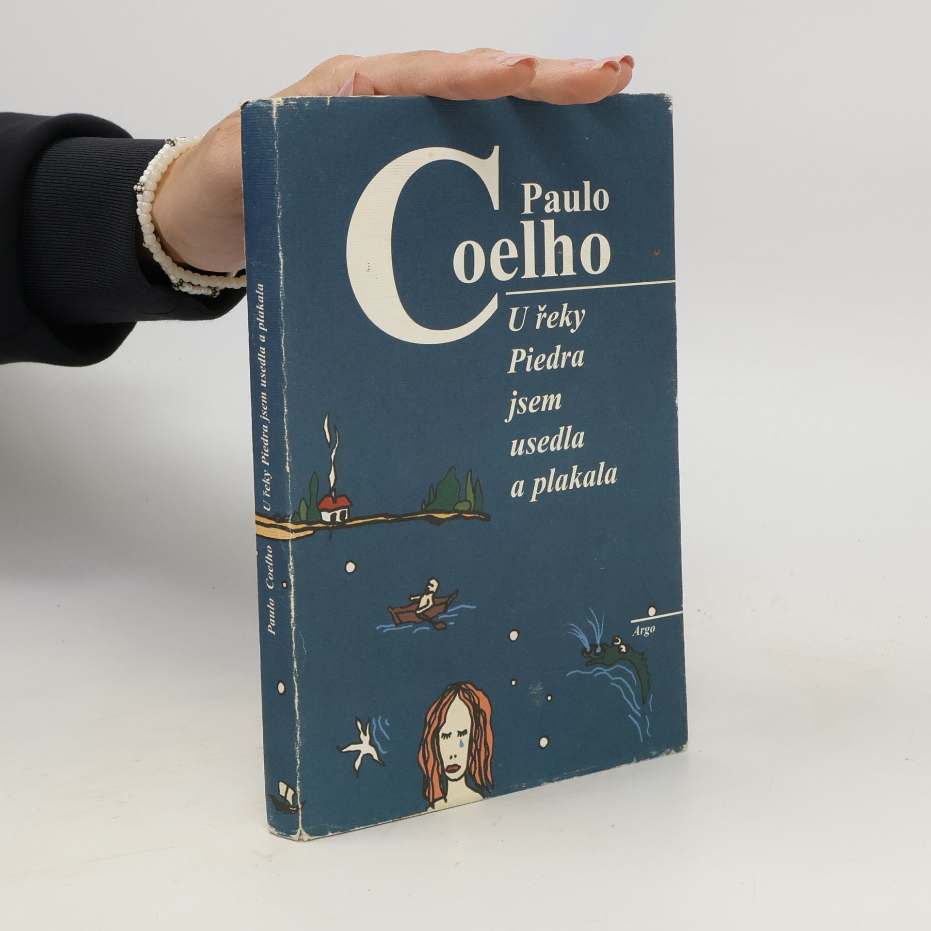 Paulo Coelho U řeky Piedra jsem usedla a plakala