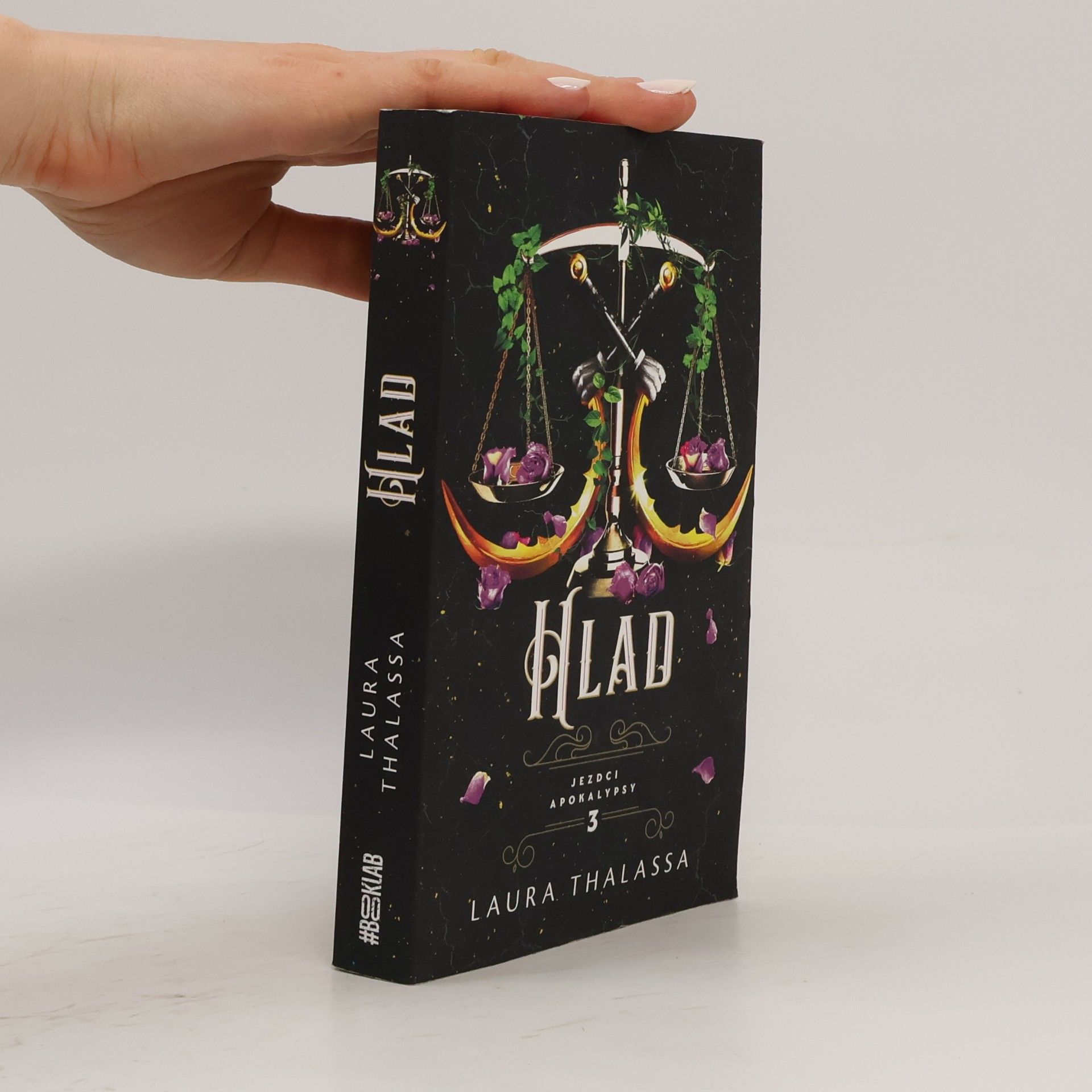 Laura Thalassa Hlad