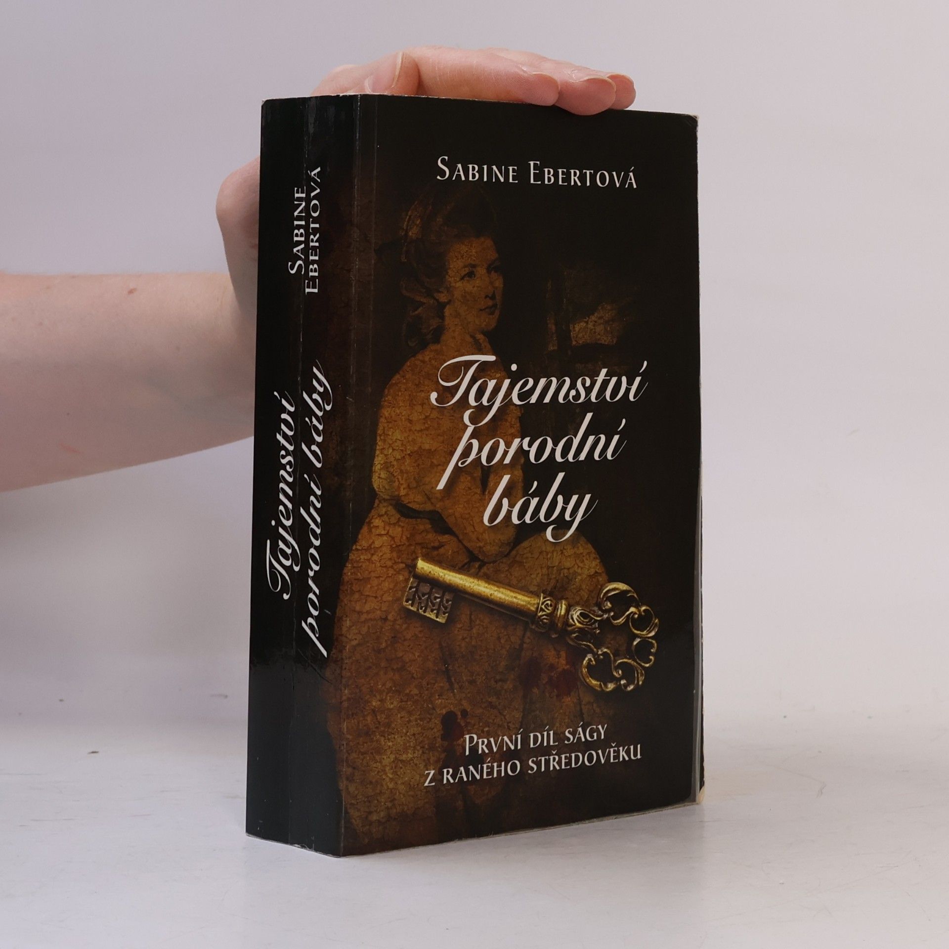 Tajemství porodní báby