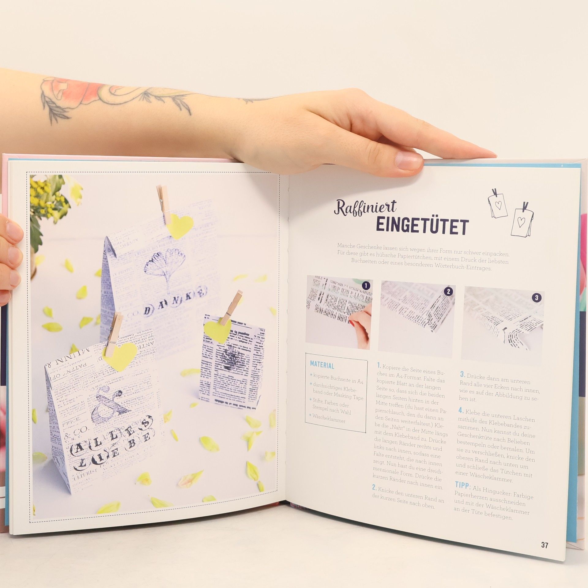 Lisa Tihanyi Sag's mit Papier