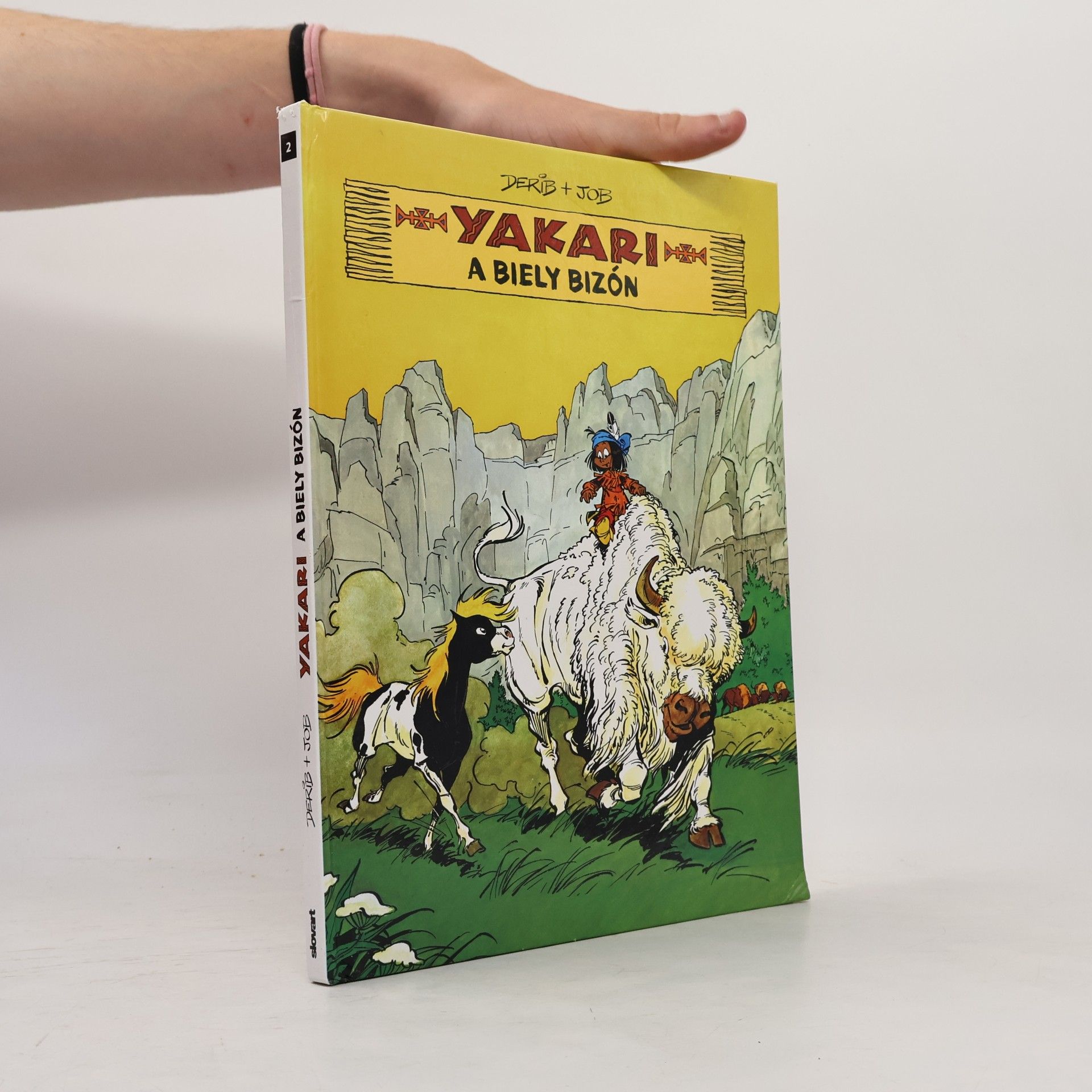 Derib Yakari a Biely bizón