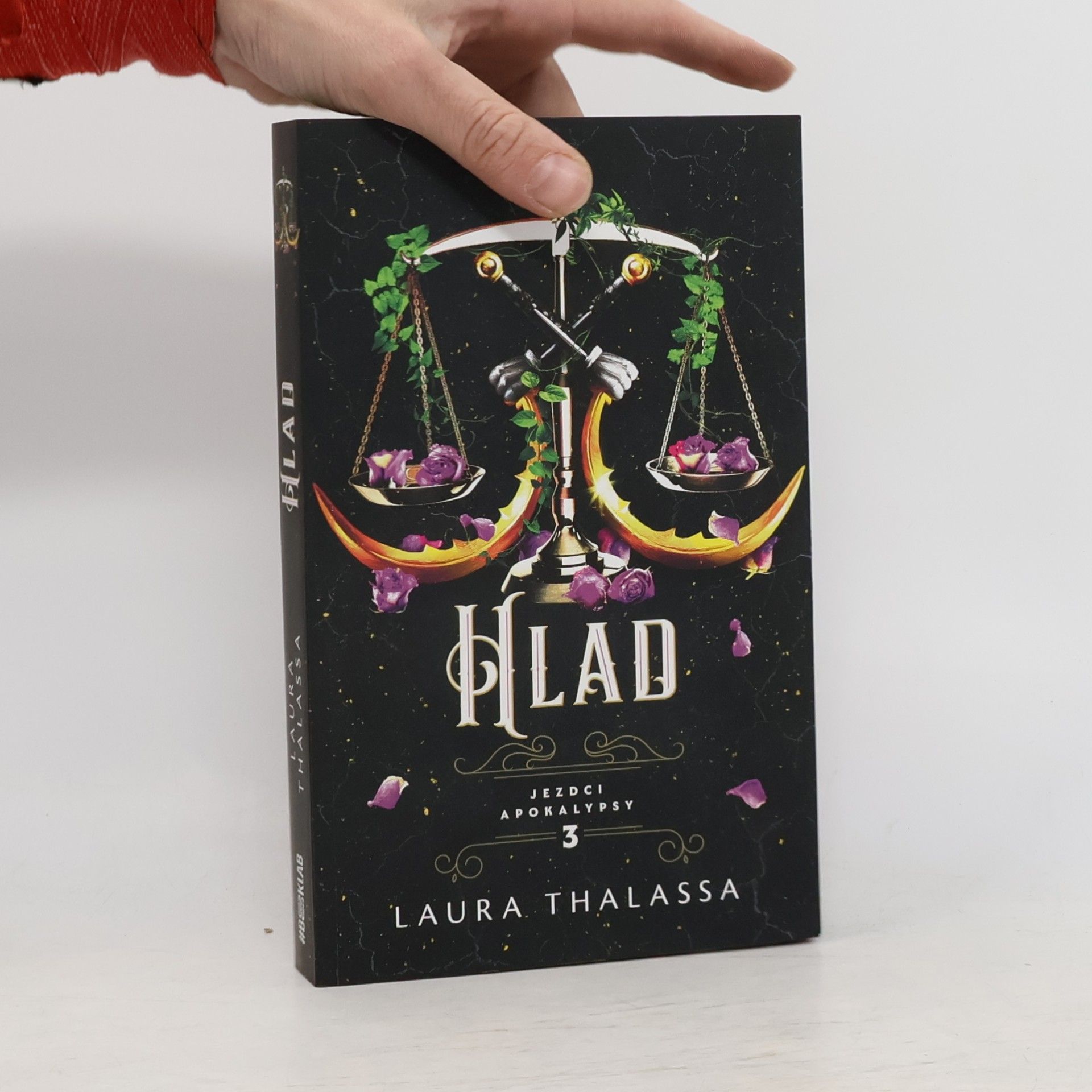 Laura Thalassa Hlad