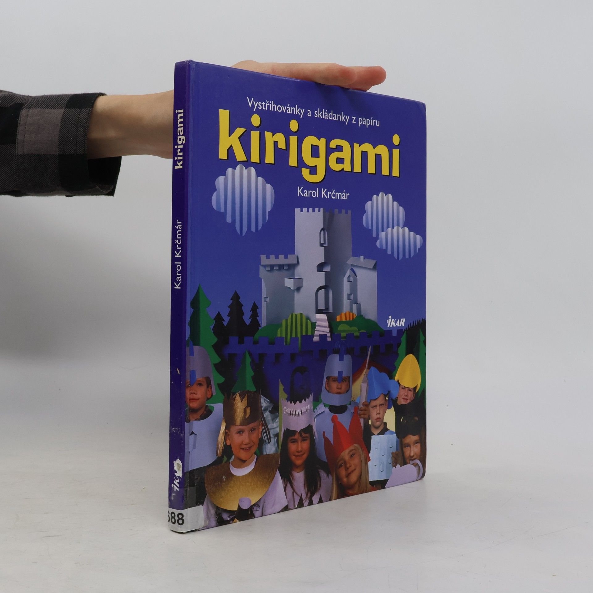Karol Krčmár Kirigami. Vystřihovánky a skládanky - tvarování papíru stříháním a překládáním s návody, kresbami a fotografiemi
