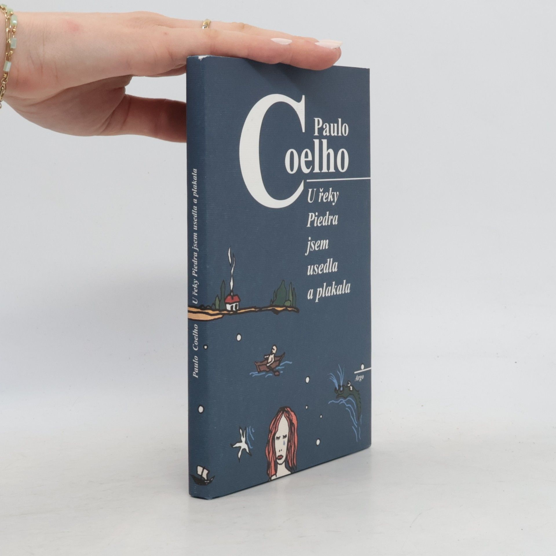 Paulo Coelho U řeky Piedra jsem usedla a plakala
