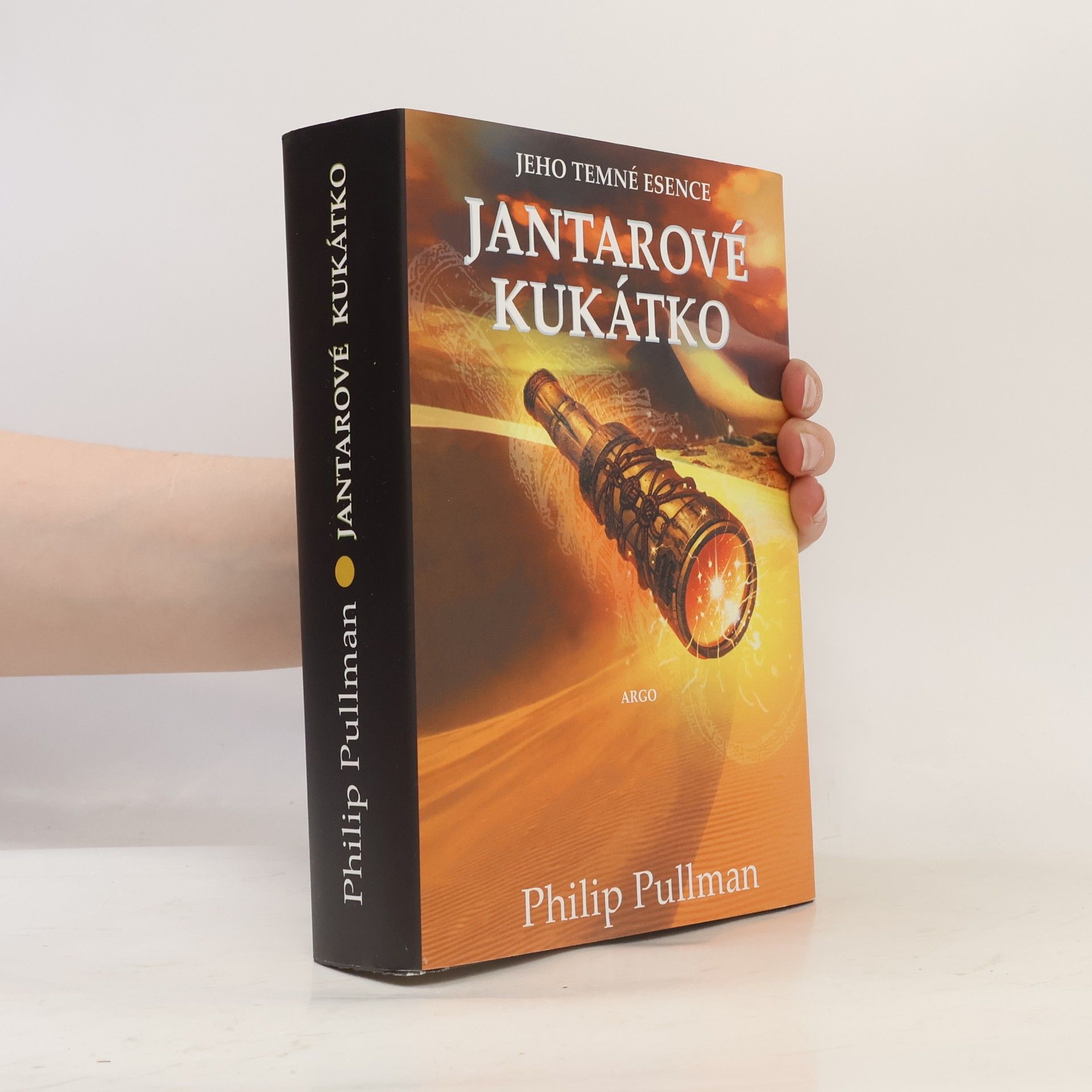 Philip Pullman Jantarové kukátko