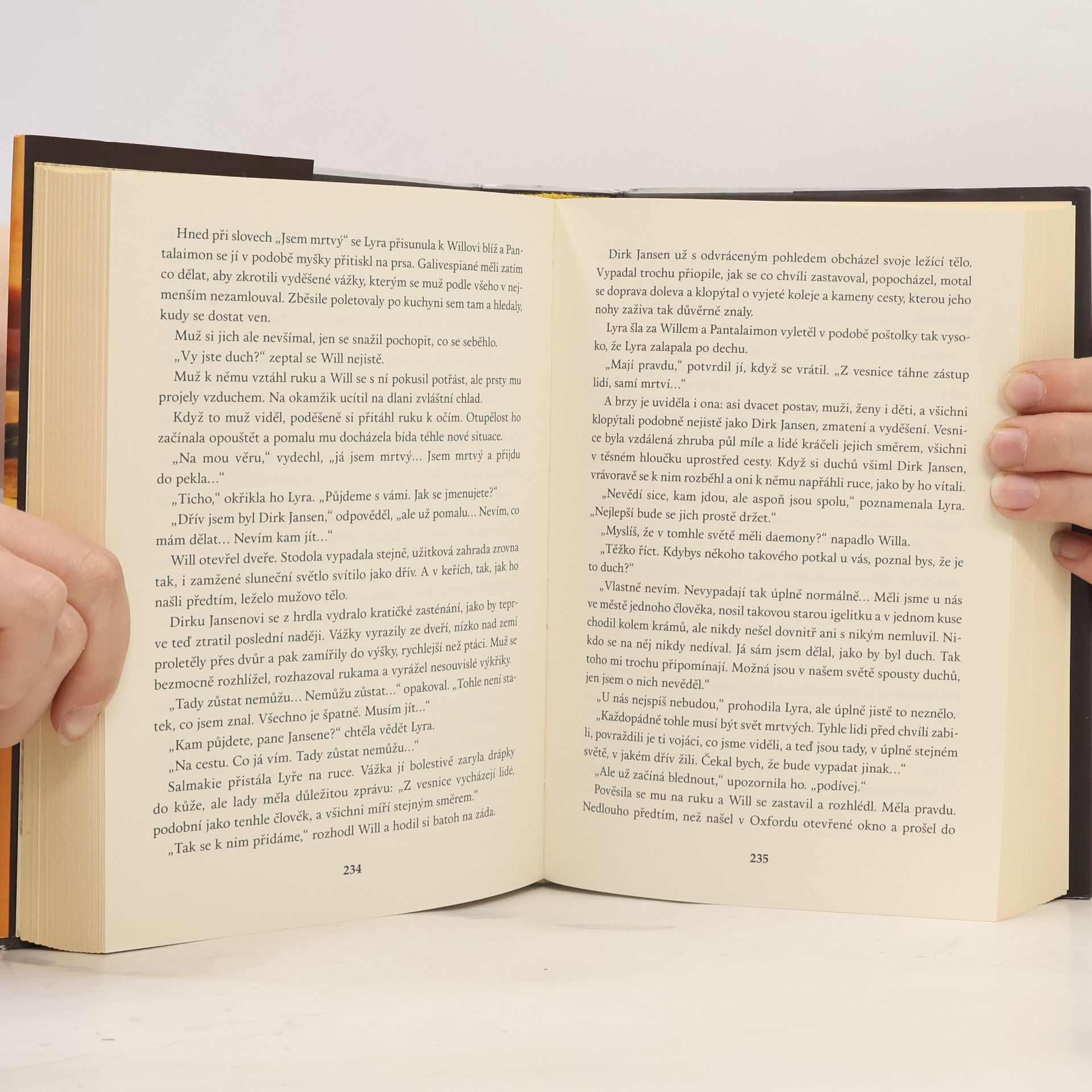 Philip Pullman Jantarové kukátko