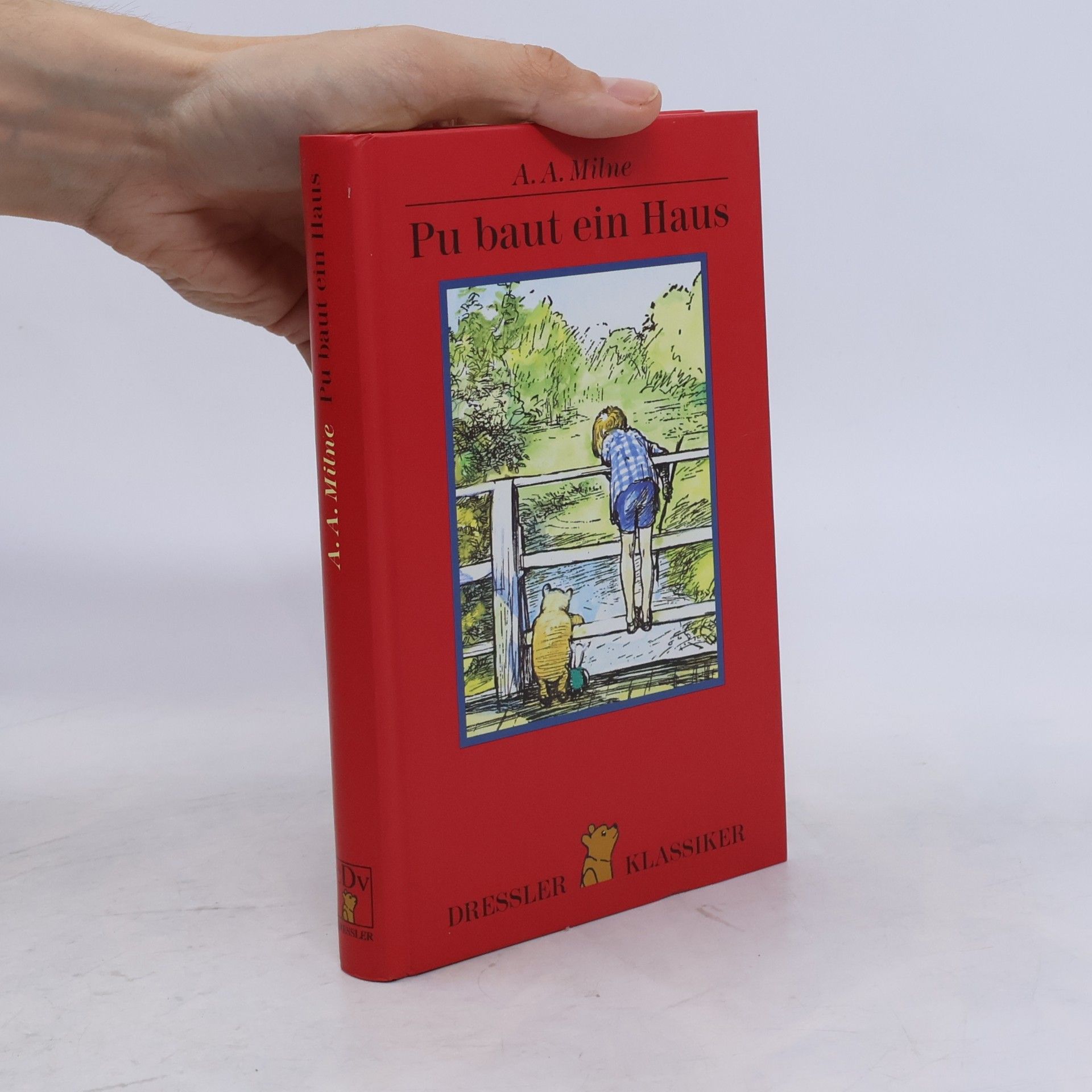 A. A. Milne Pu baut ein Haus