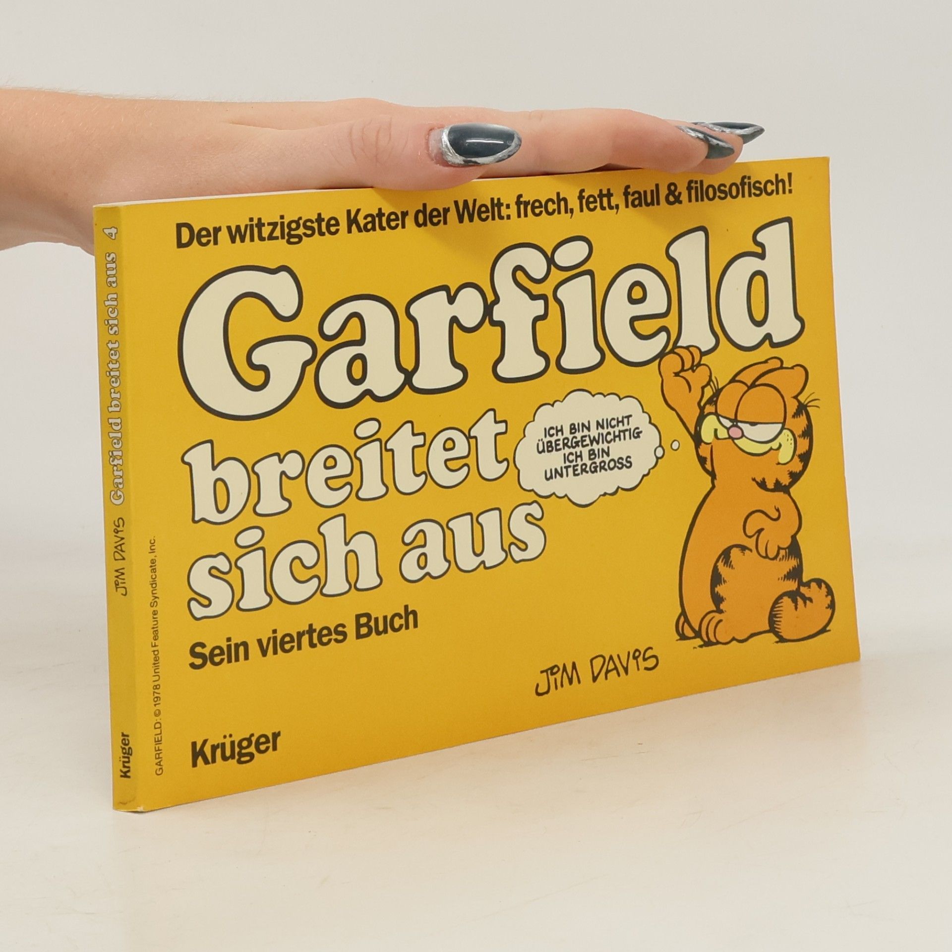 Jim Davis Garfield brietet sich aus