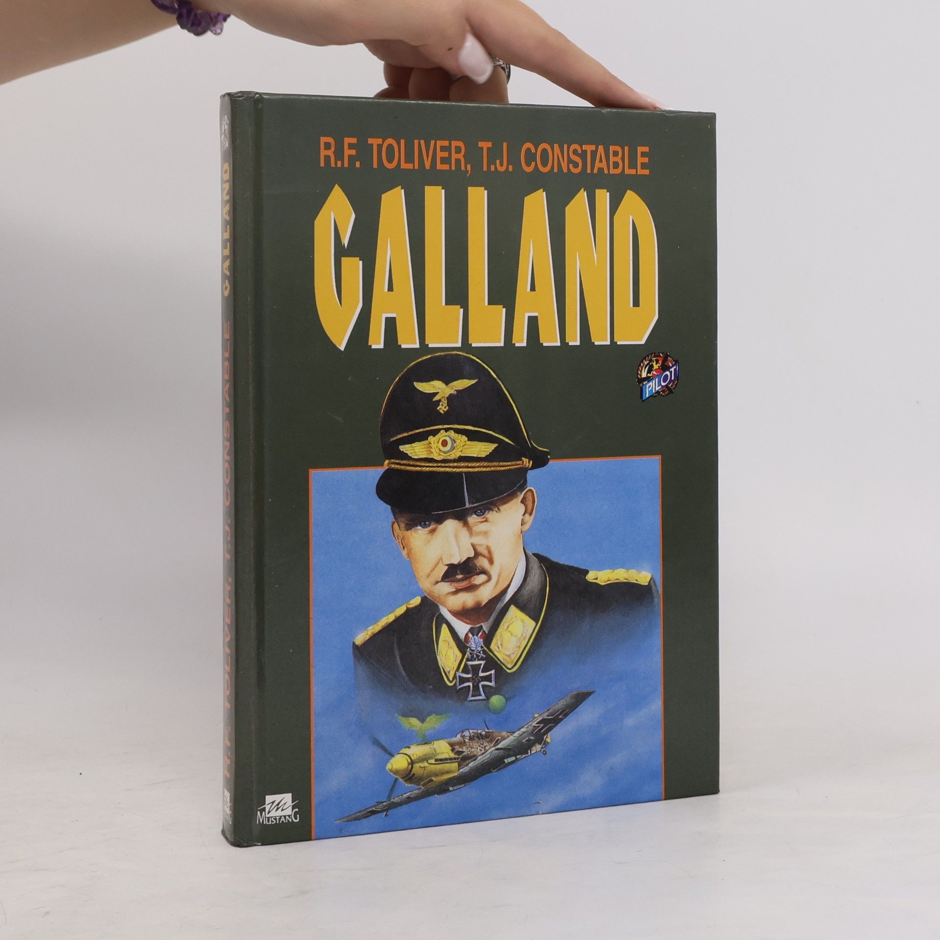 Raymond F. Toliver Galland