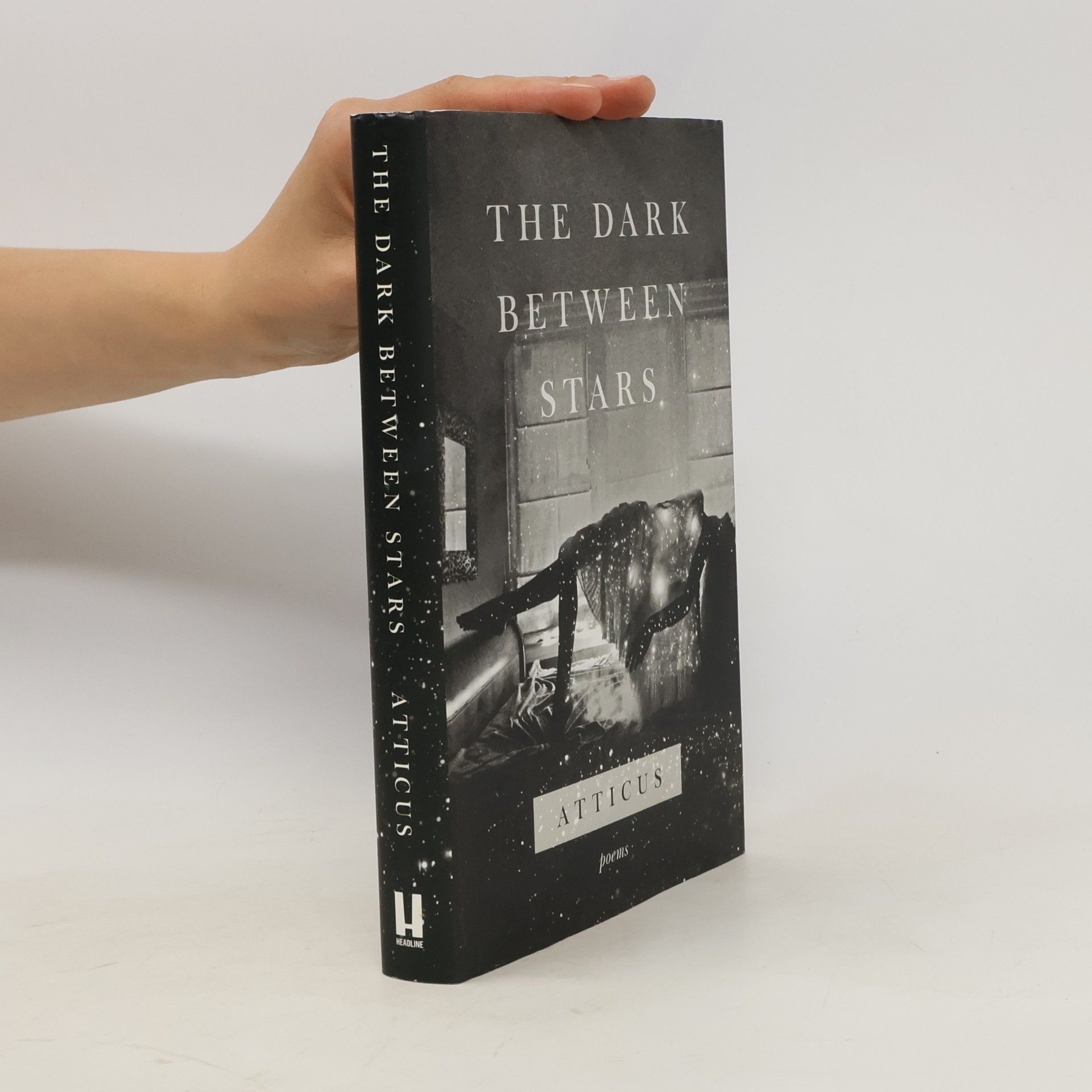 Atticus The dark between stars: Poems