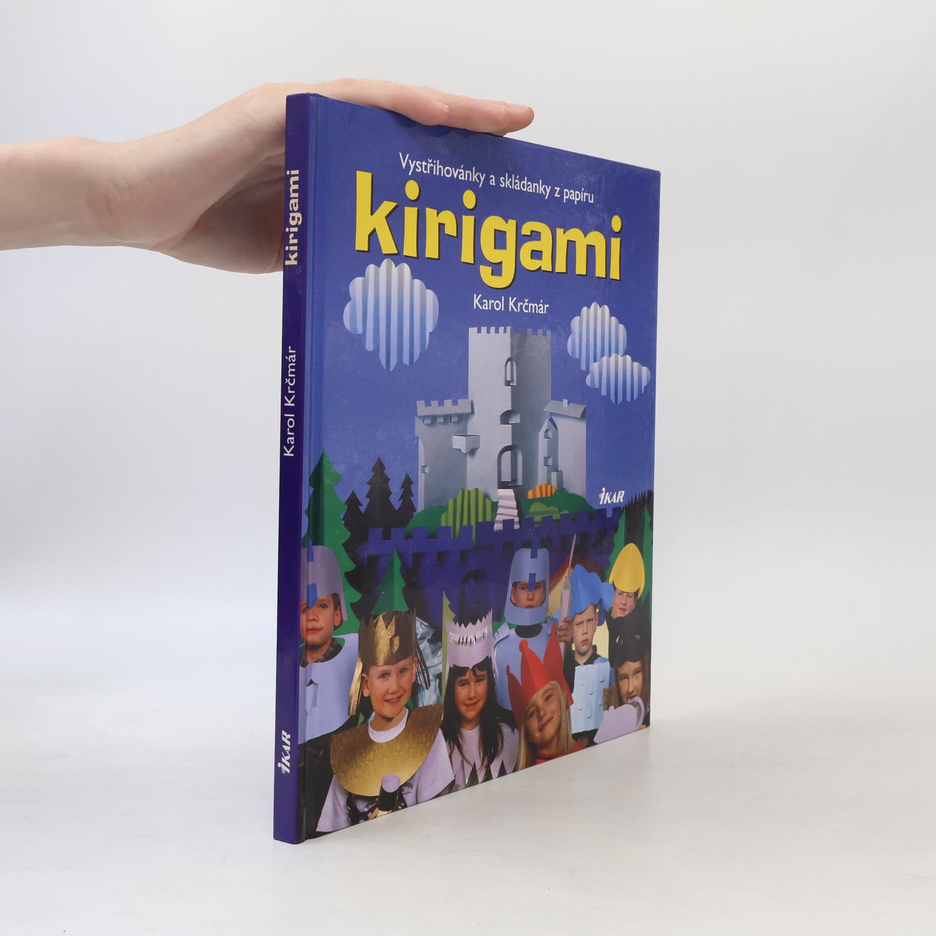 Karol Krčmár Kirigami. Vystřihovánky a skládanky - tvarování papíru stříháním a překládáním s návody, kresbami a fotografiemi