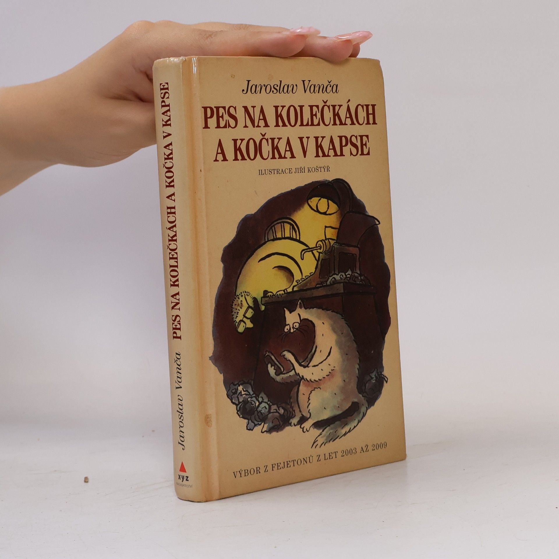 Pes na kolečkách a kočka v kapse