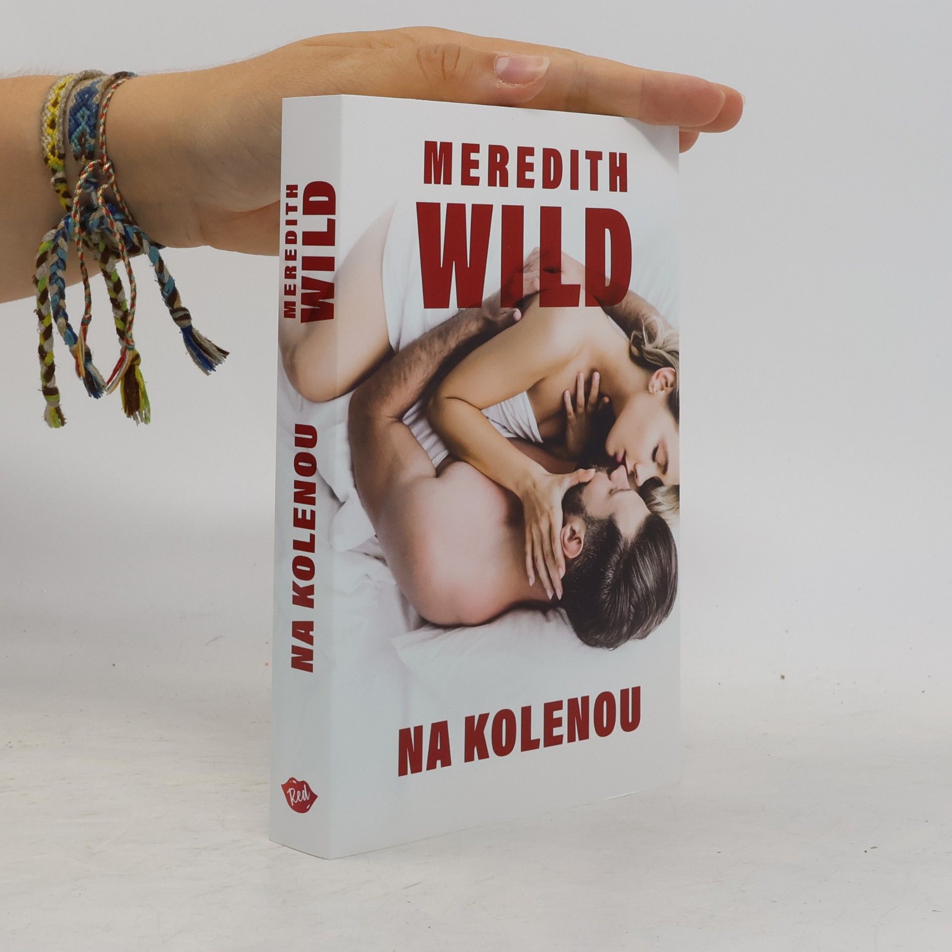 Meredith Wild Na kolenou