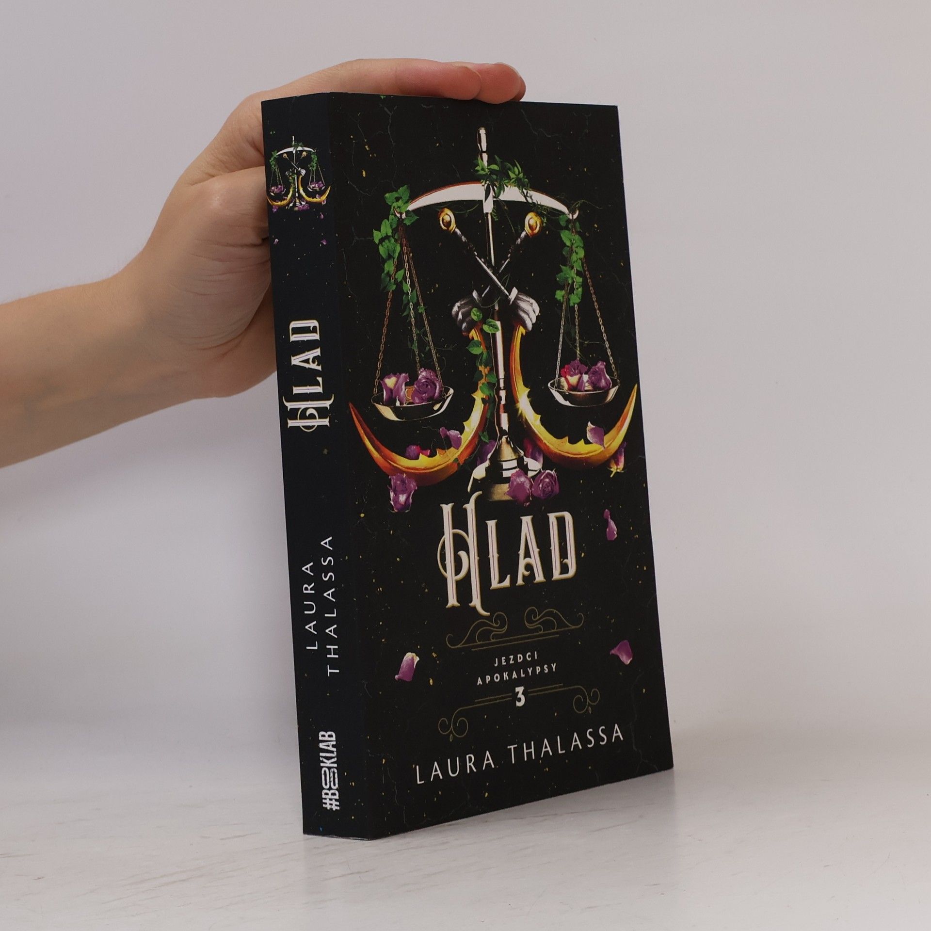 Laura Thalassa Hlad