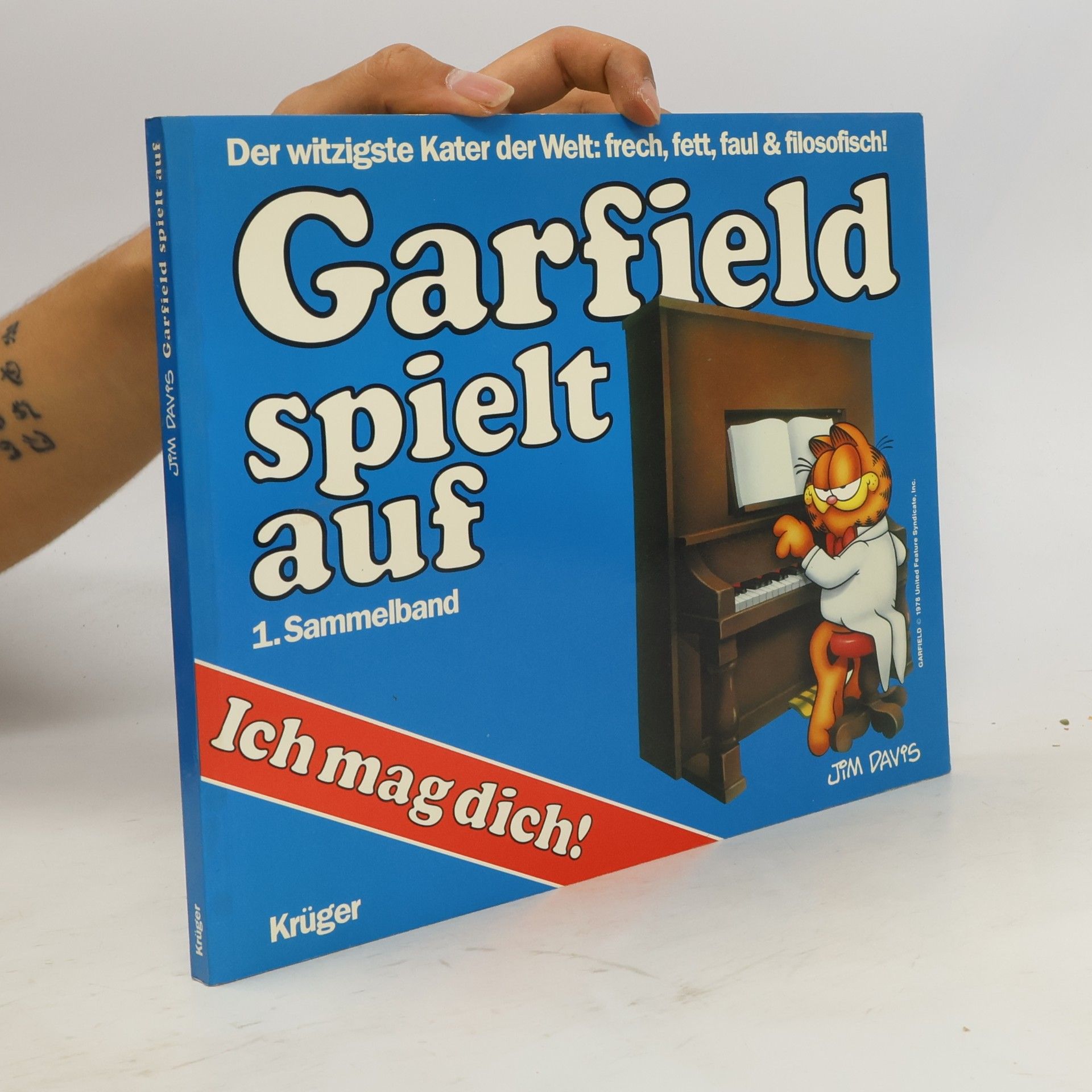 Jim Davis Garfield spielt auf