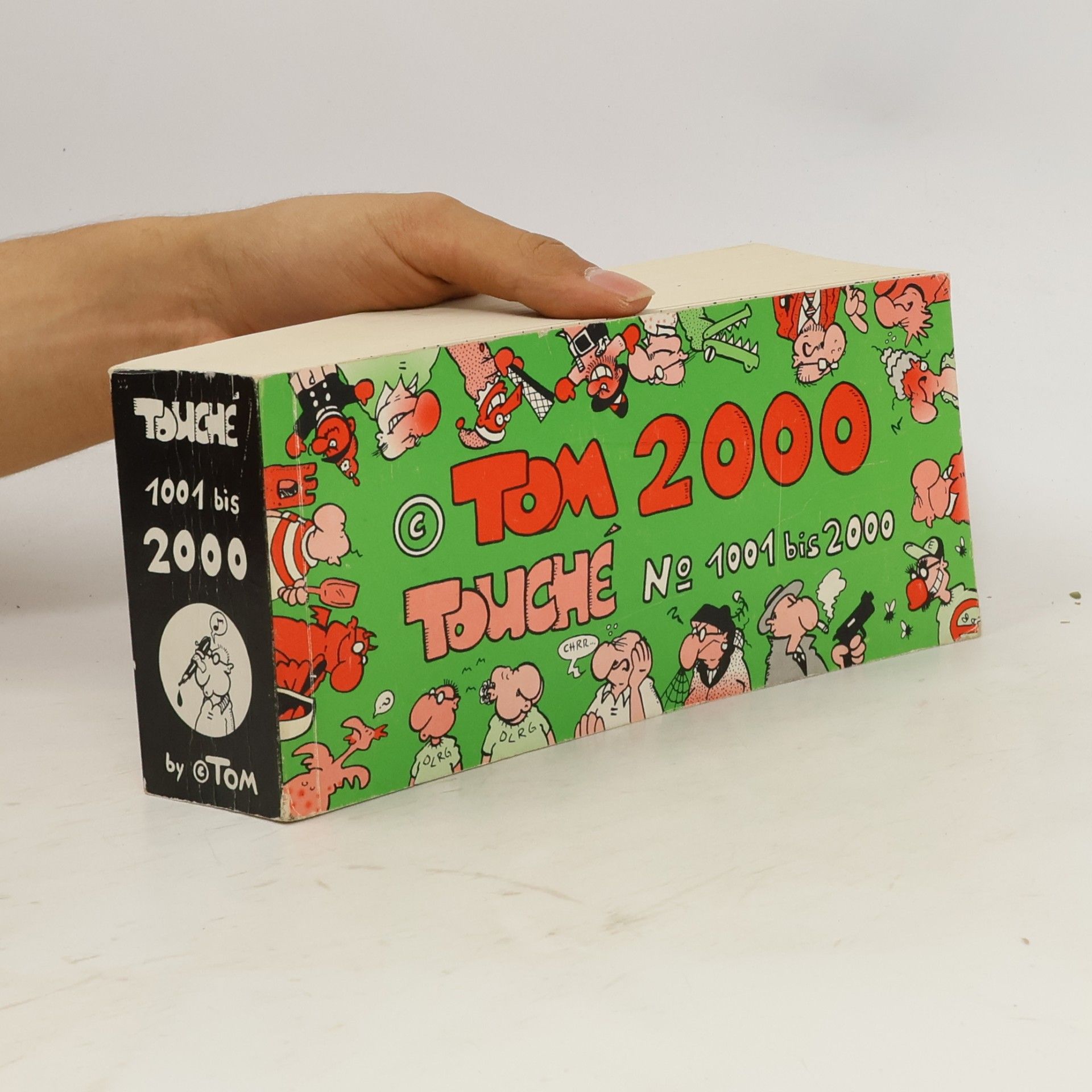 T. Om Tom 2000